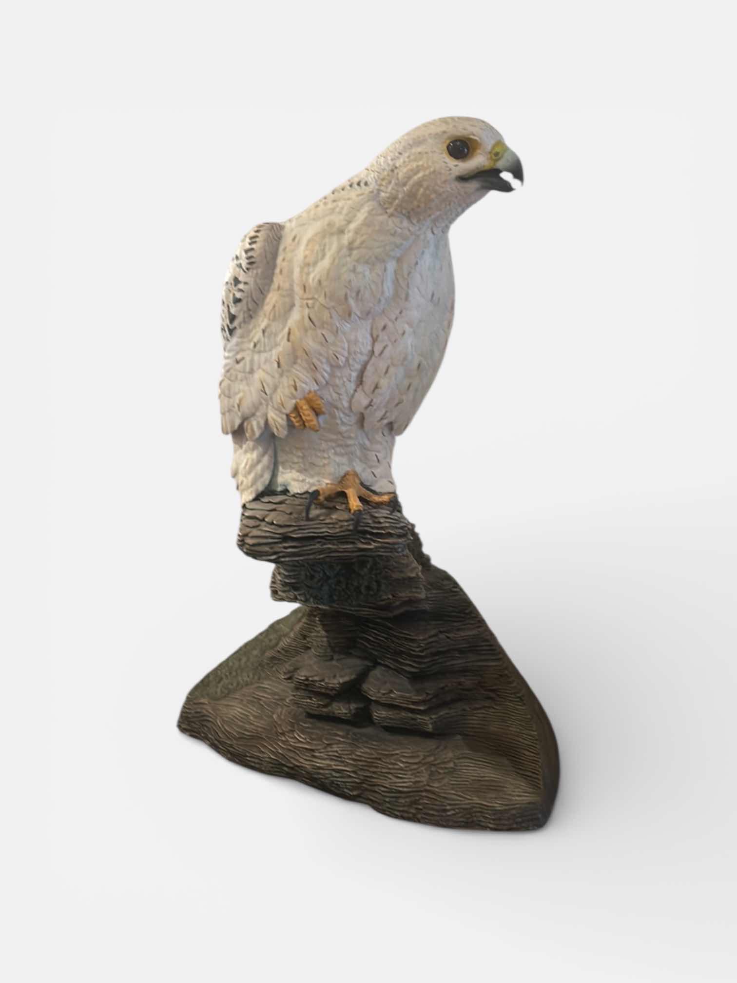 Photo 1 of CERAMIC FALCON FIGURINE PERCHED ON ROCK BASE, WILDLIFE SCULPTURAL DECOR PIECE. 18“ x H25“