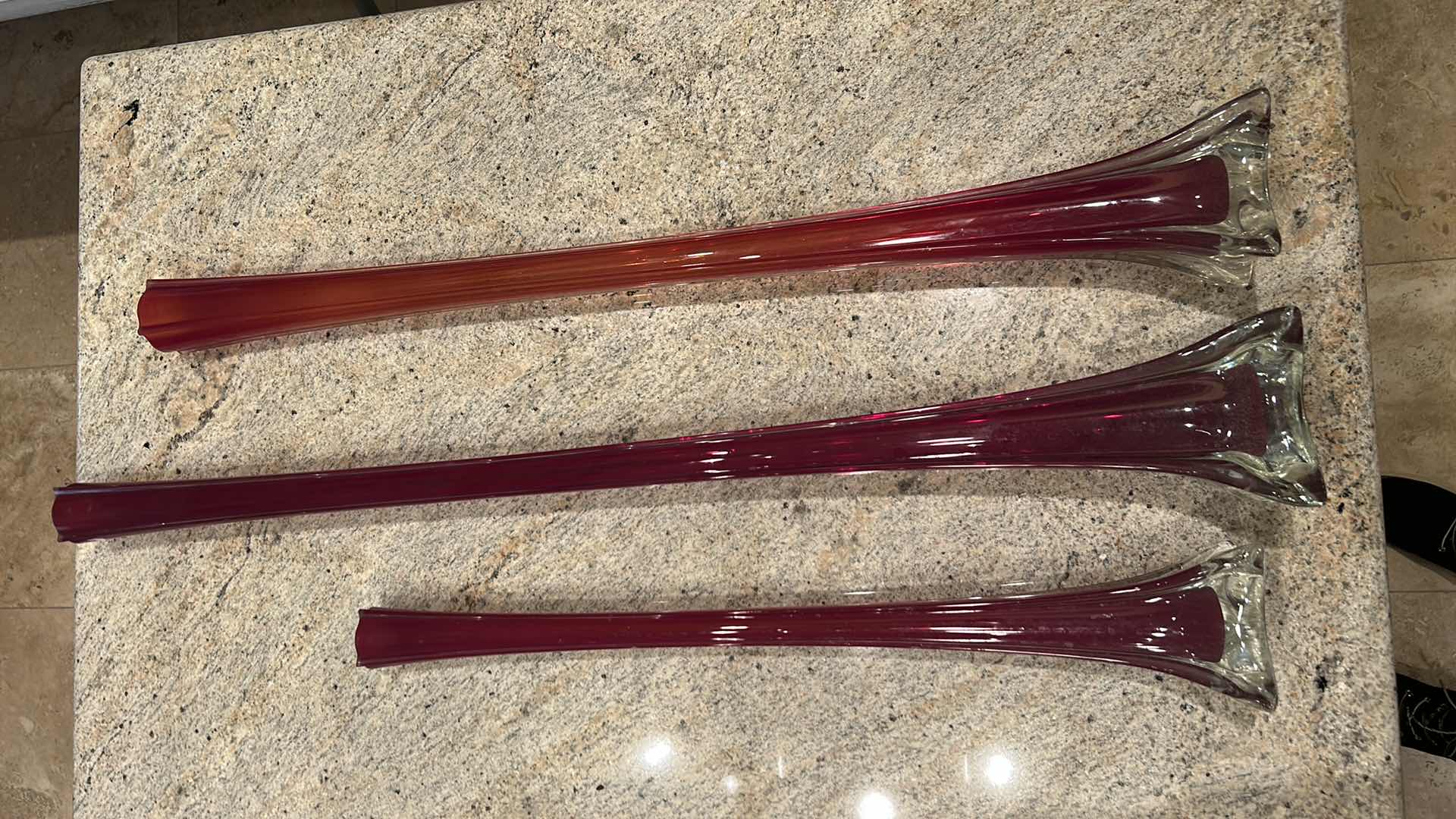 Photo 1 of SET OF VINTAGE MID-CENTURY MODERN RED CASED GLASS “SWUNG” OR “ELEPHANT FOOT” BUD VASES  (TALLEST 35 1/2”)