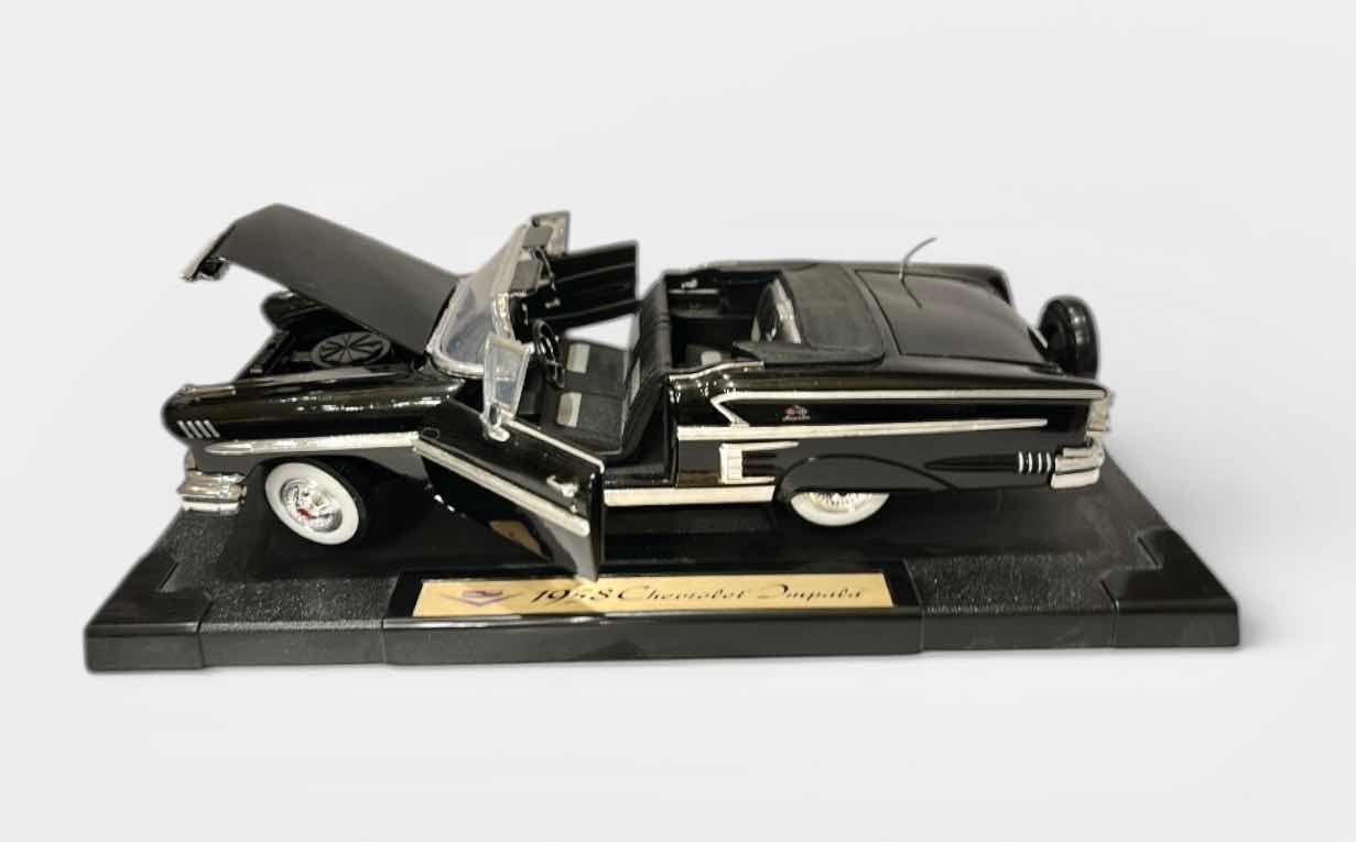 Photo 1 of DIE CAST 1958 CHEVROLET IMPALA COLLECTIBLE MODEL CAR (CAR LENGTH 12 INCHES)