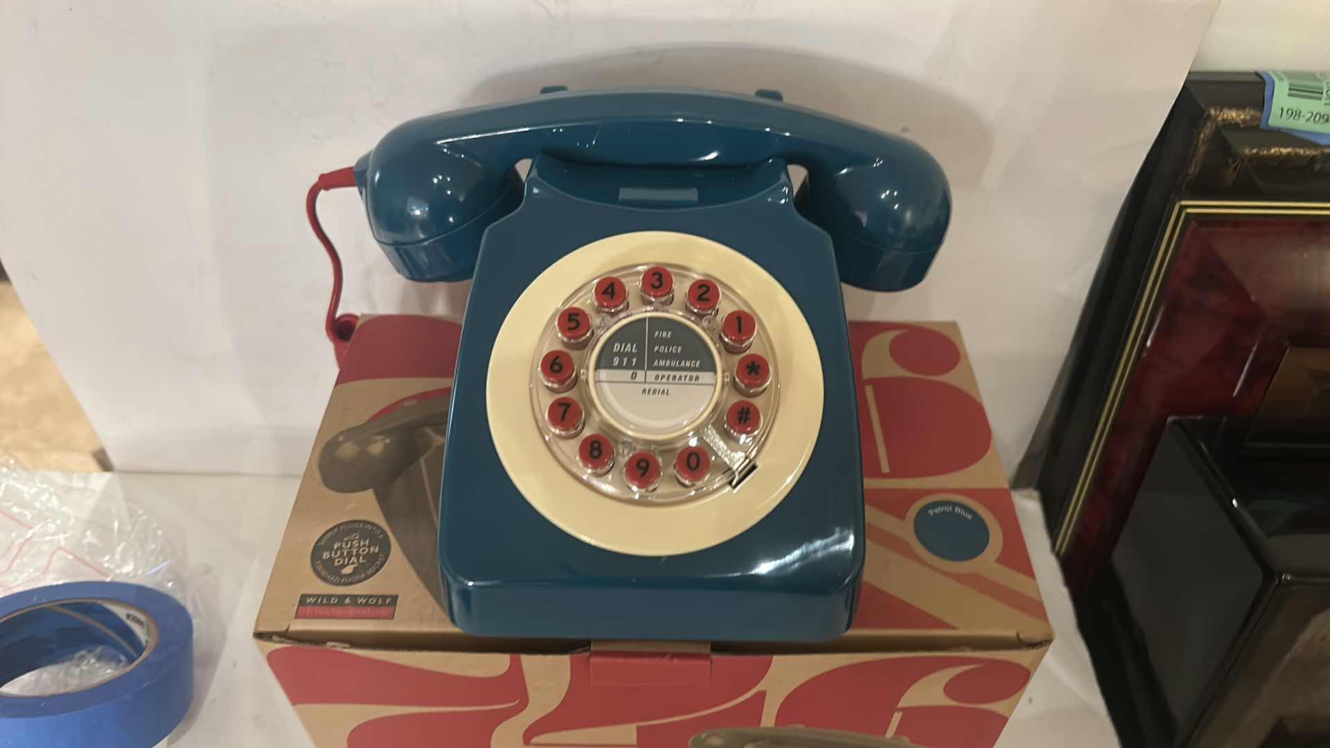 Photo 1 of NEW WILD & WOLF ROTARY-STYLE PUSH-BUTTON TELEPHONE.