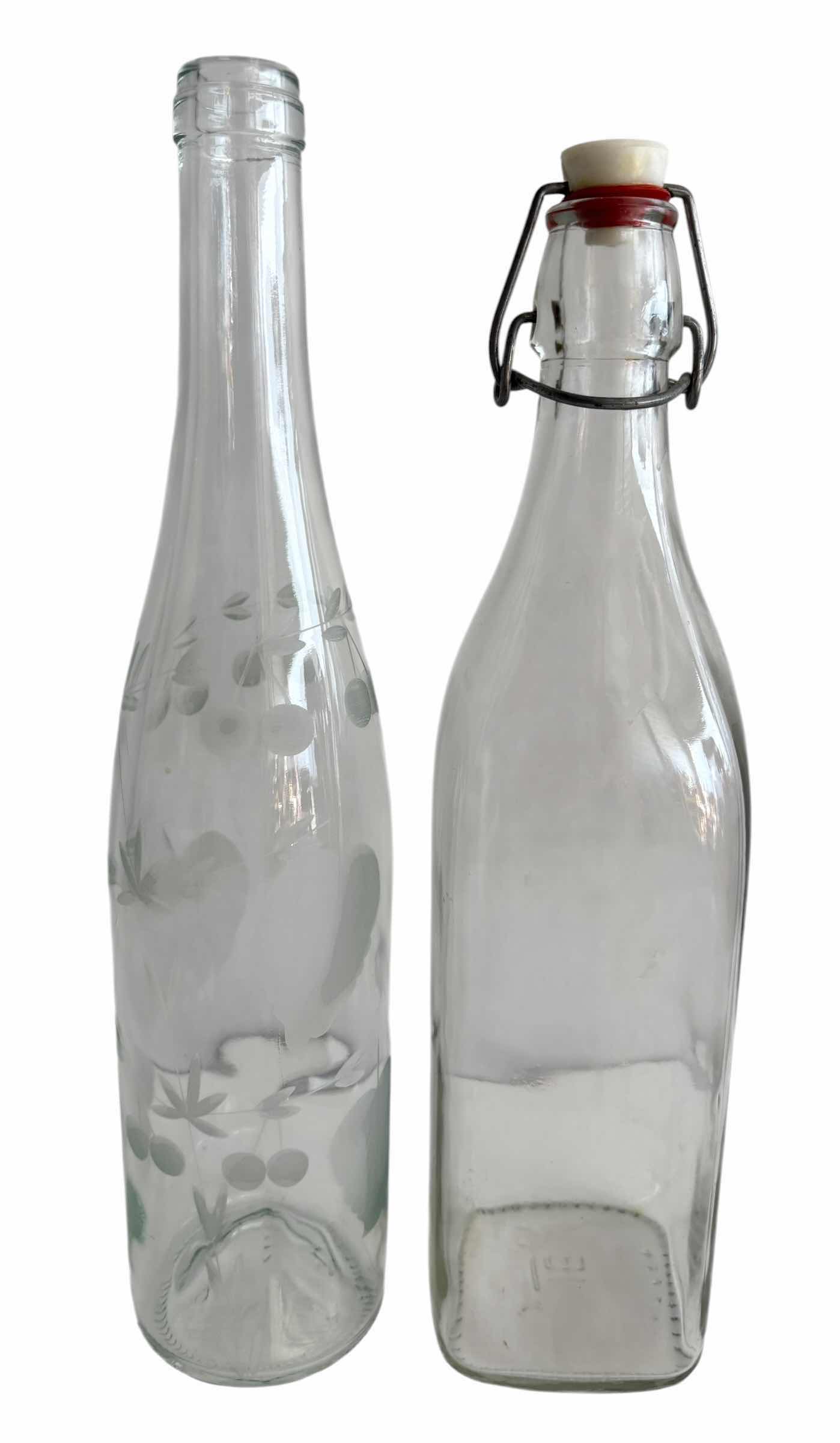 Photo 1 of WOODEN SERVING PADDLE, RED HOBNAIL GLASS BOTTLES & DECORATIVE GLASS BOTTLES (4)
