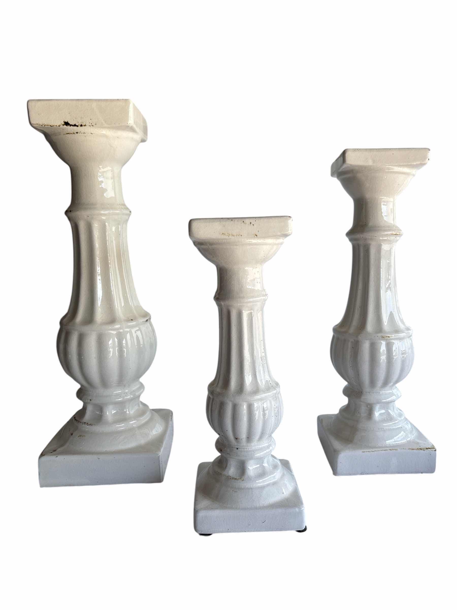 Photo 1 of (3)PCS WHITE CERAMIC CANDLE HOLDER W GLOSSY FINISH FLUTED DESIGN H18.5”