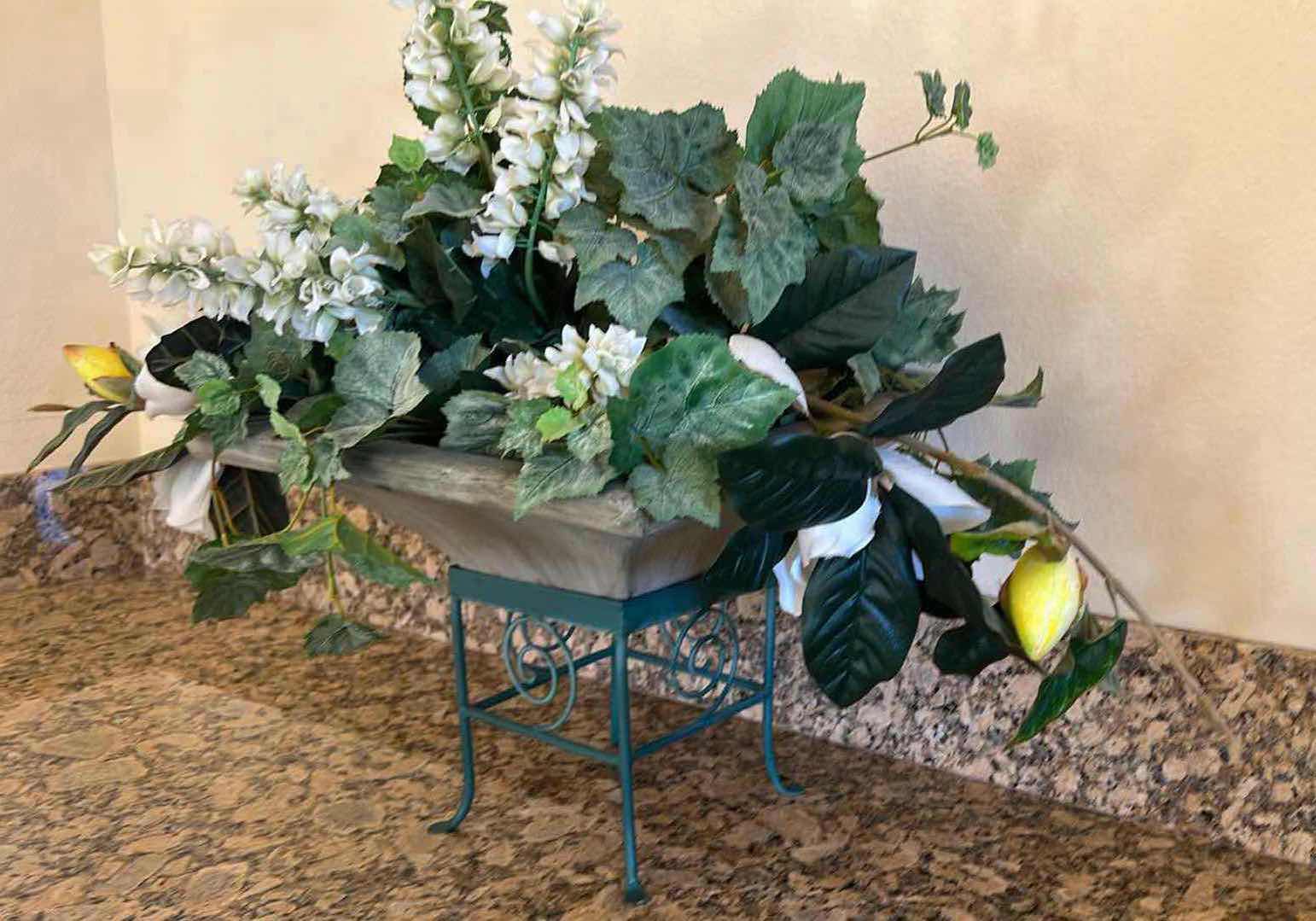 Photo 1 of FAUX FLORAL PLANT ARRANGEMENT IN HEAVY CERAMIC VASE ON GREEN METAL STAND 38" x 17" H27"