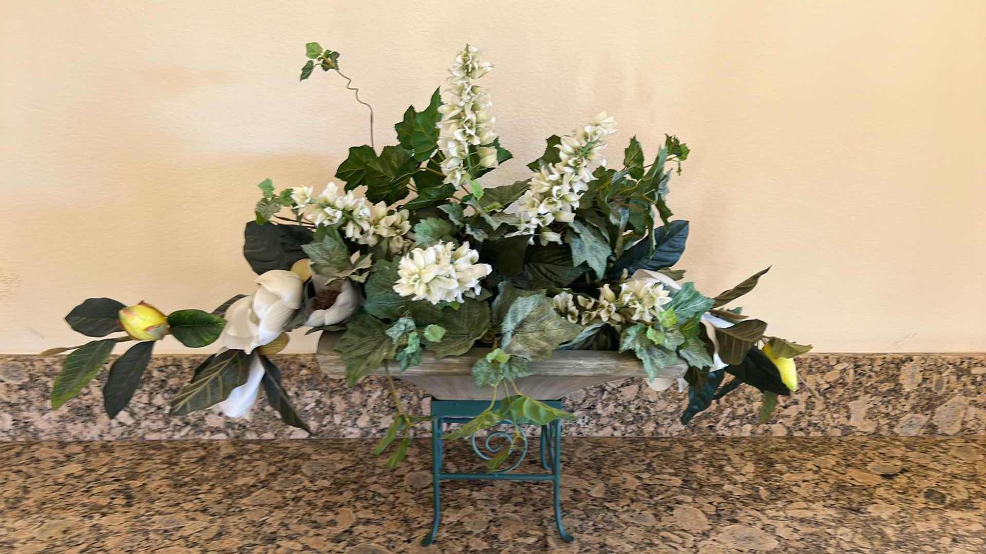 Photo 1 of FAUX FLORAL PLANT ARRANGEMENT IN HEAVY CERAMIC VASE ON GREEN METAL STAND 38" x 17" H27"