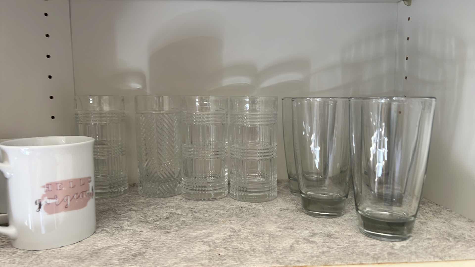 Photo 1 of CONTENTS OF KITCHEN CABINET- GLASSWARE