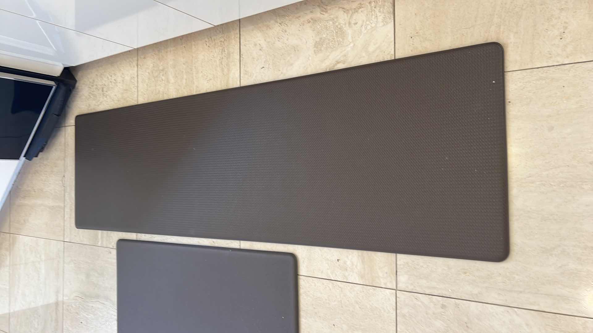 Photo 1 of 2-RUBBER PADDED FLOOR MATS (60" x 17" & 30" x 17")