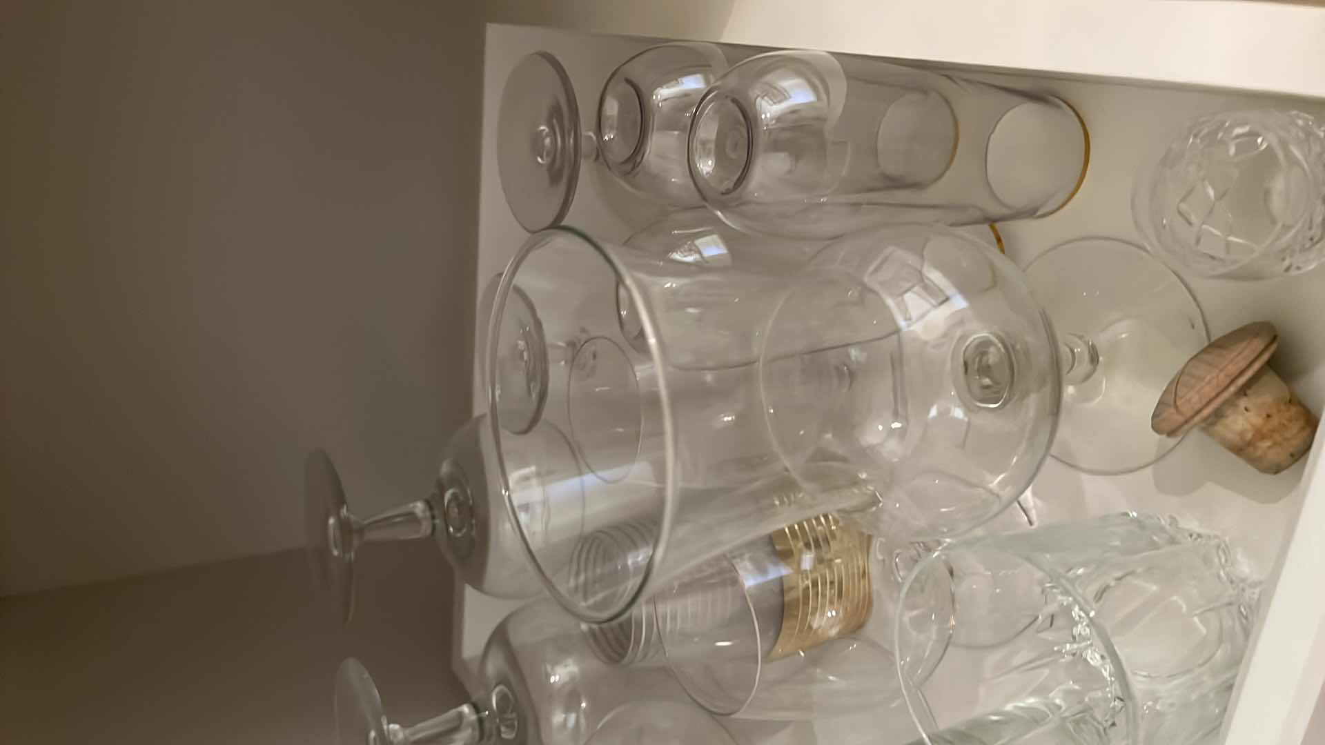 Photo 1 of CONTENTS OF BAR CABINET DRAWER-BAR GLASSES