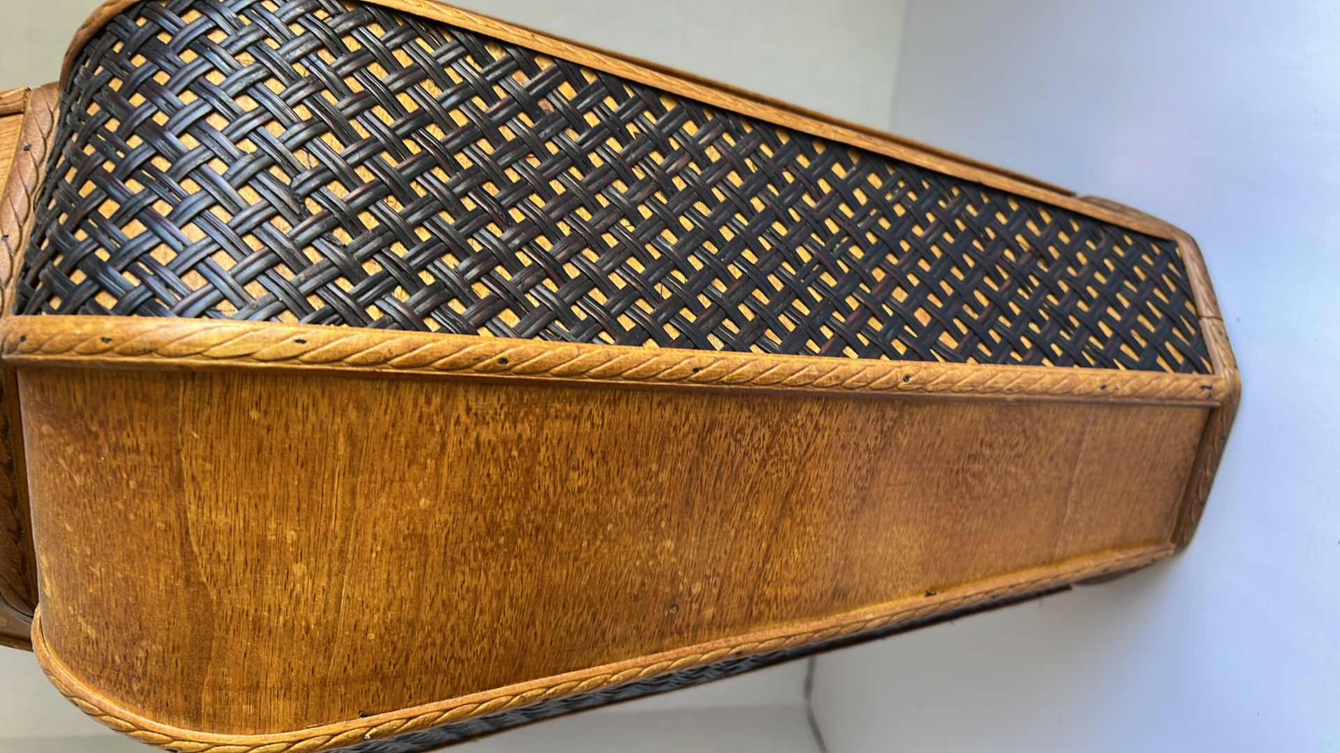 Photo 1 of DECORATIVE ORANGE-BROWN WOODEN VASE. WITH FAUX REEDS AND PLANTS. 10” WICKER AND WOOD DETAILING. 1 OF 2 IN SET. SOLD SEPARATELY