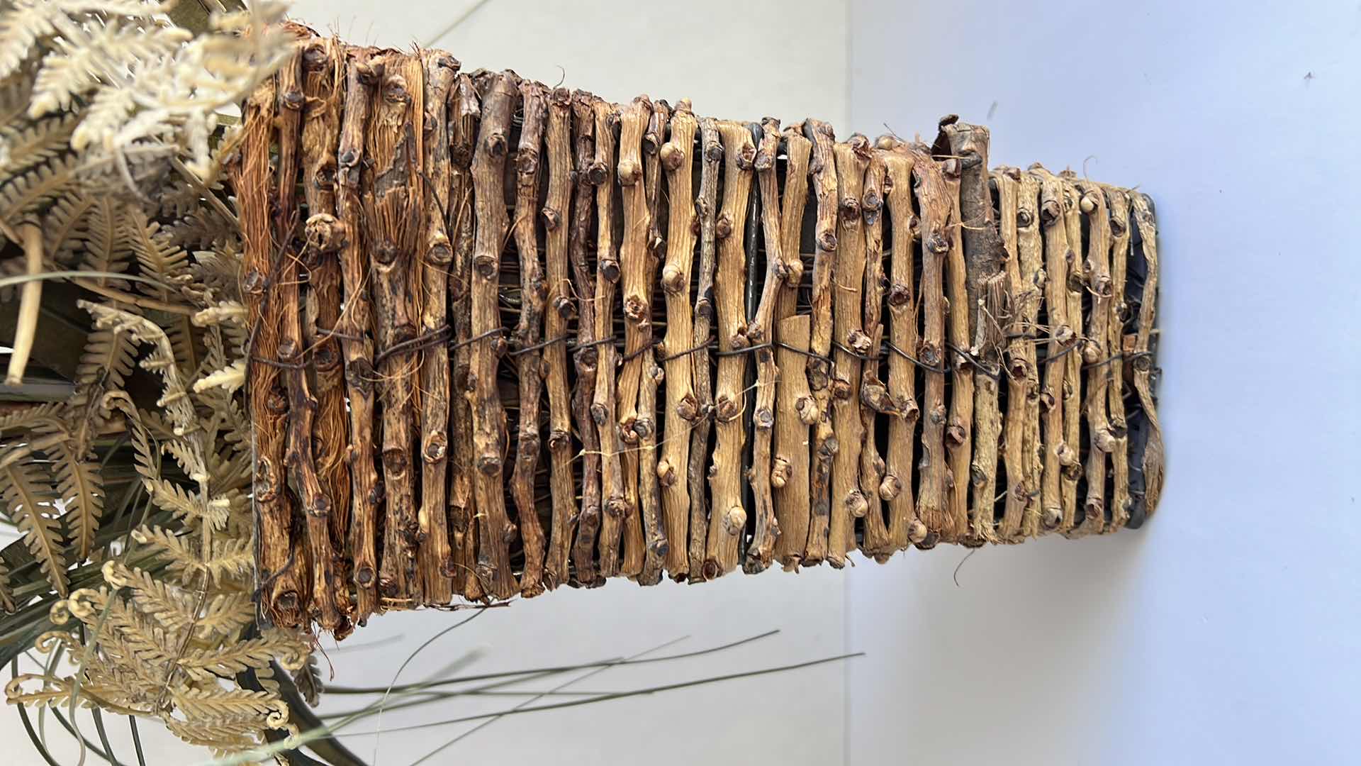 Photo 1 of DECORATIVE WOVEN WOOD VASE WITH FAUX PLANTS. 10” VASE. 2 IN SET, SOLD SEPARATELY.