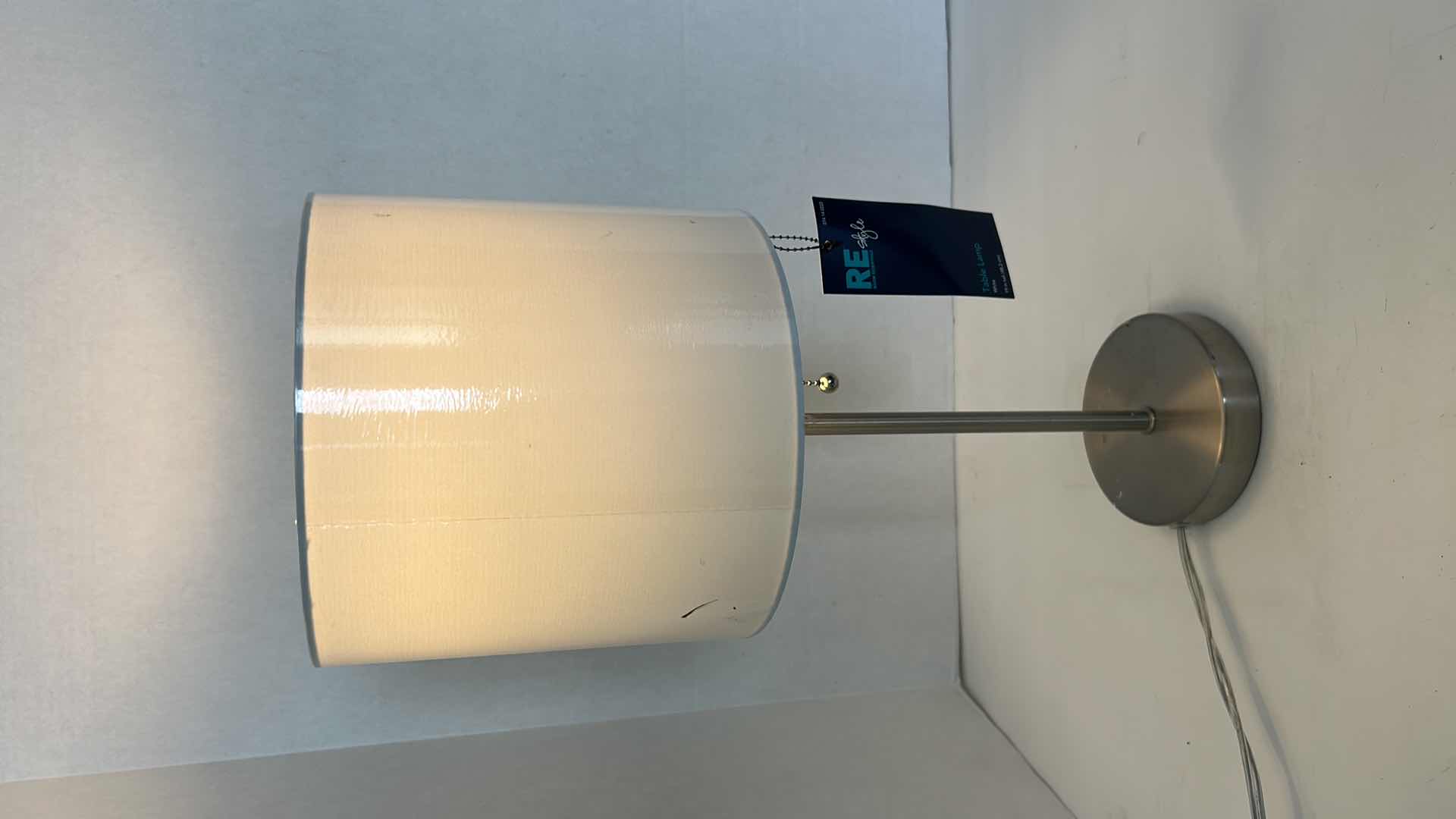 Photo 1 of 2- SILVER BASE W WHITE SHADE TABLE LAMP H 19"