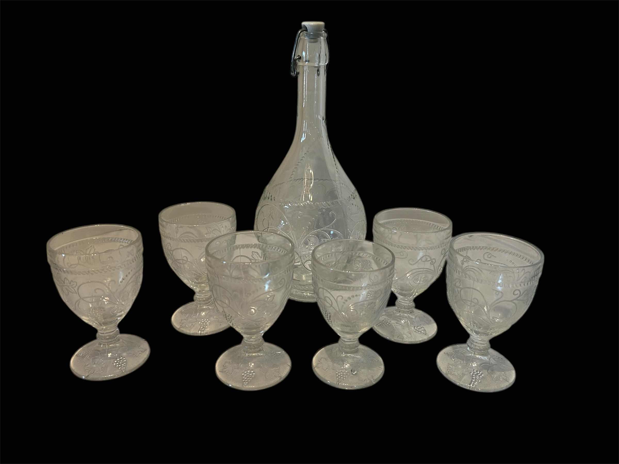 View 1 of VINTAGE CRYSTAL DECANTER H 14”
W 6- CRYSTAL GOBLETS WILLIAM SONOMA