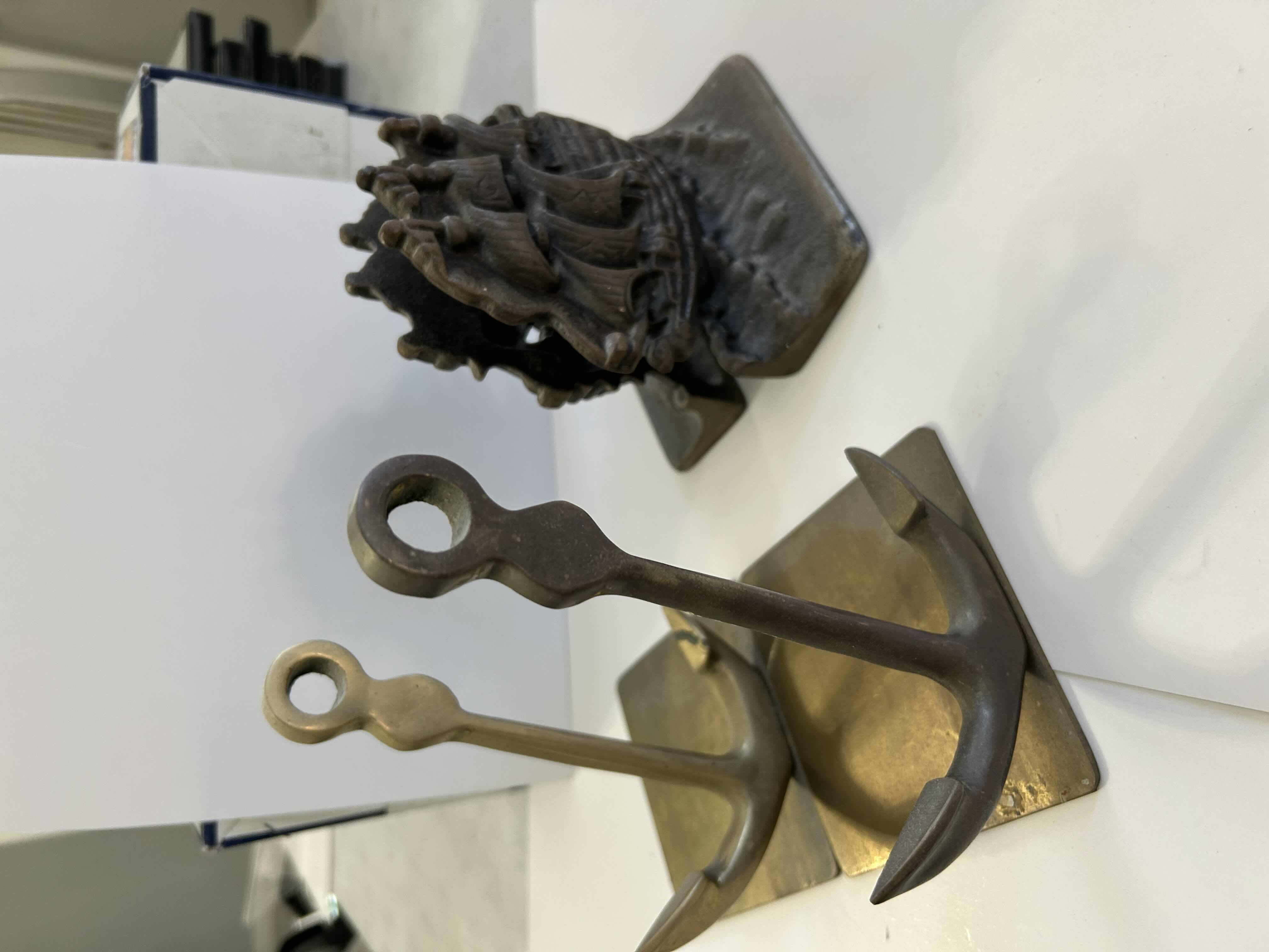 Photo 1 of CAST IRON SAILING SHIP BOOKENDS AND VINTAGE BRASS ANCHOR BOOKENDS