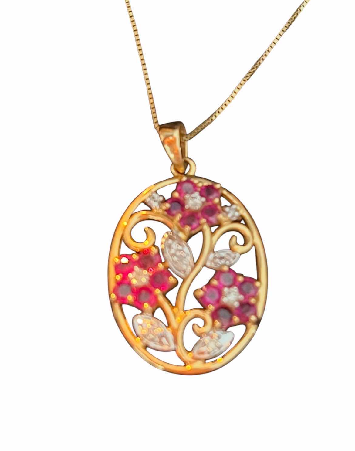 Photo 1 of FINE JEWLERY-RUBY AND DIAMOND FLOWER PENDANT NECKLACE.