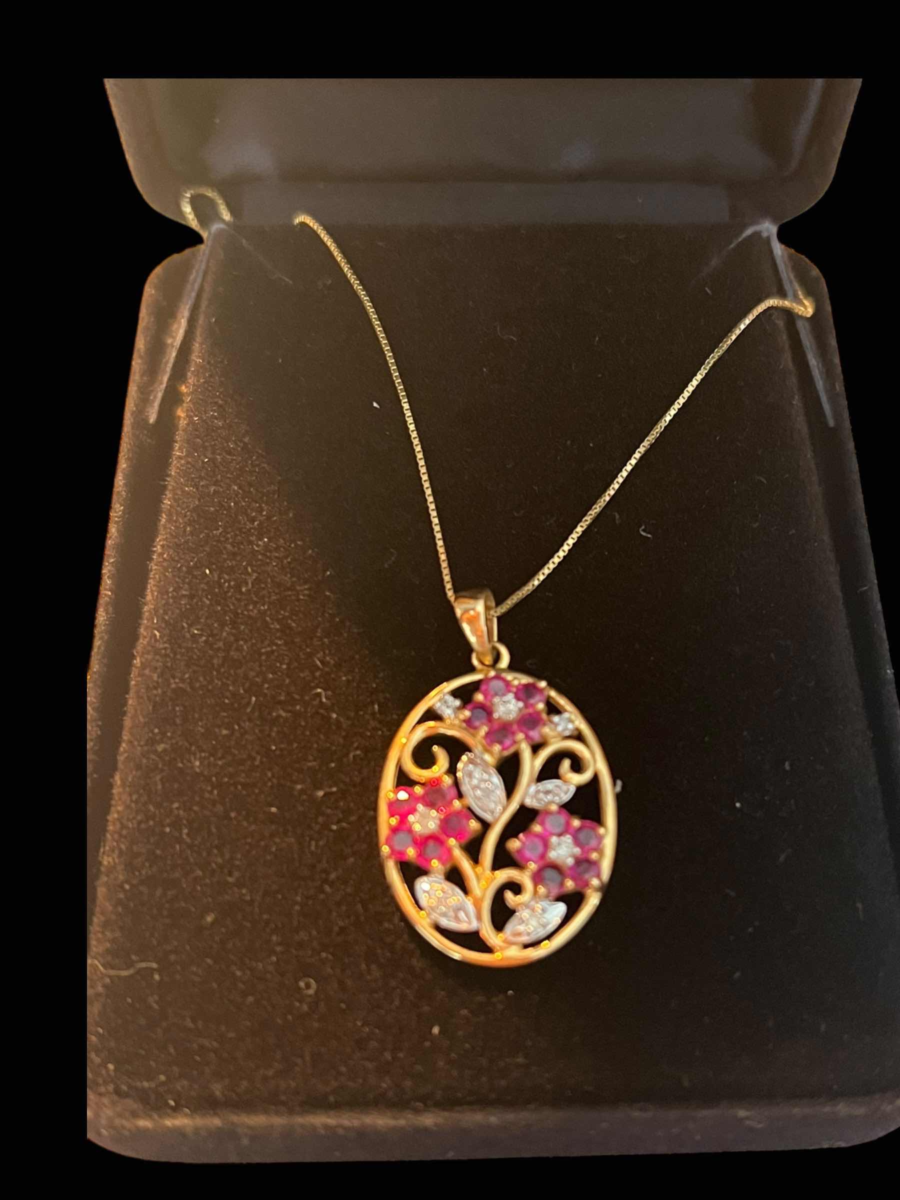 Photo 1 of FINE JEWLERY-RUBY AND DIAMOND FLOWER PENDANT NECKLACE.