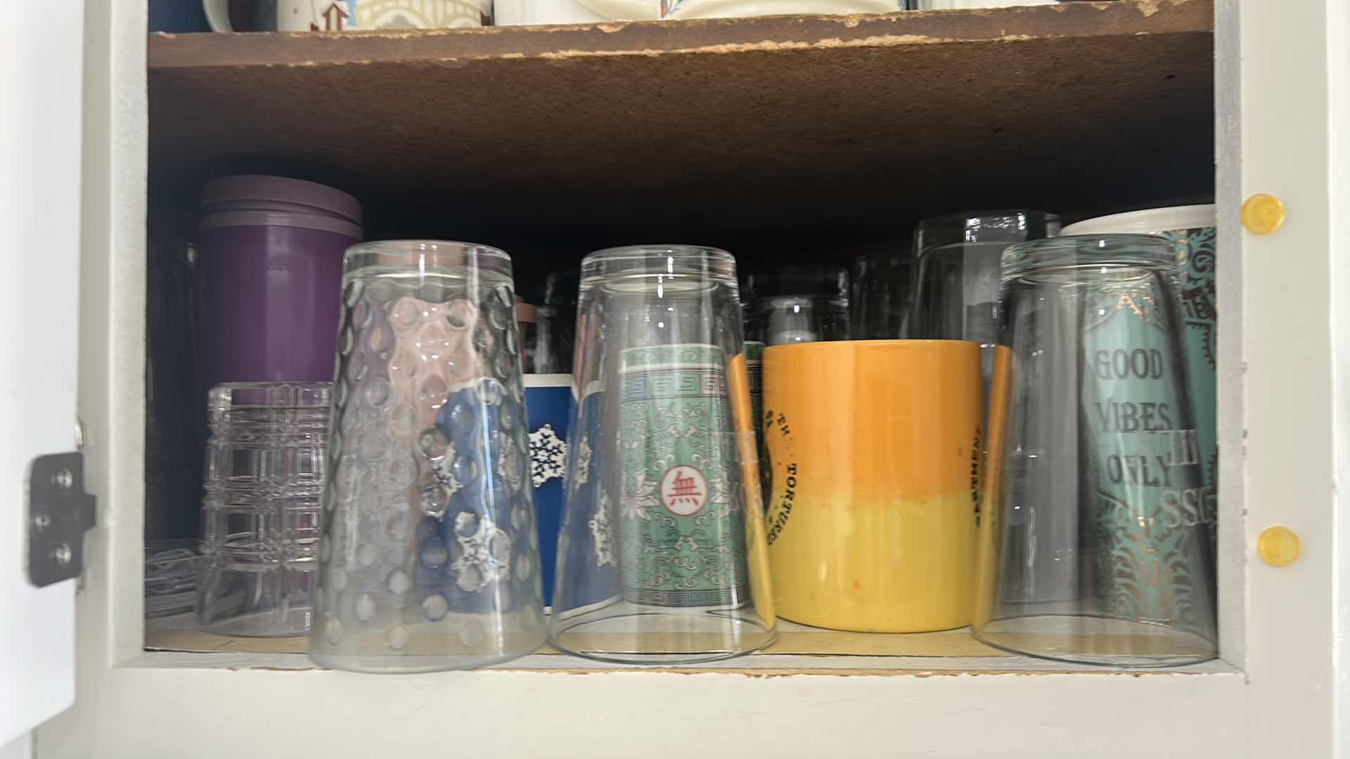 Photo 1 of CONTENTS OF CABINET ASSORTED GLASSWARE COFFEE MUGS