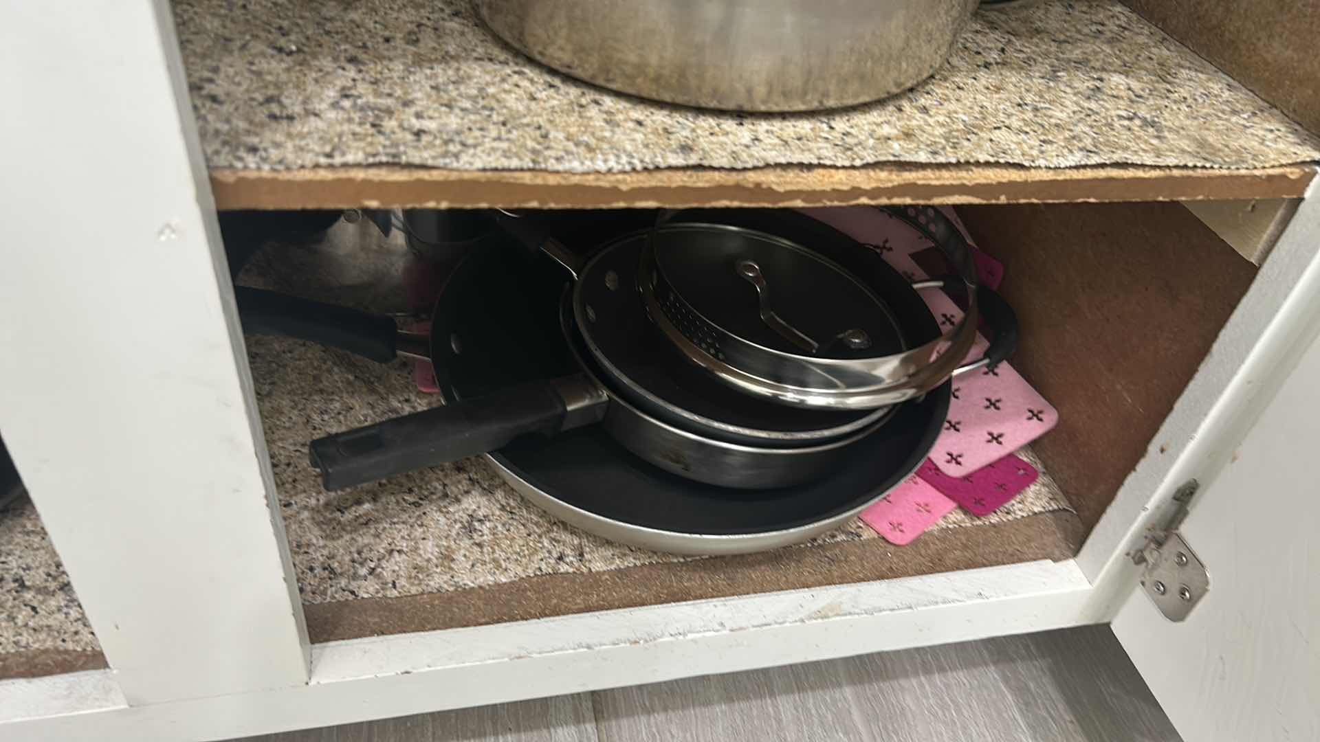Photo 4 of CONTENTS OF CABINET POTS PANS