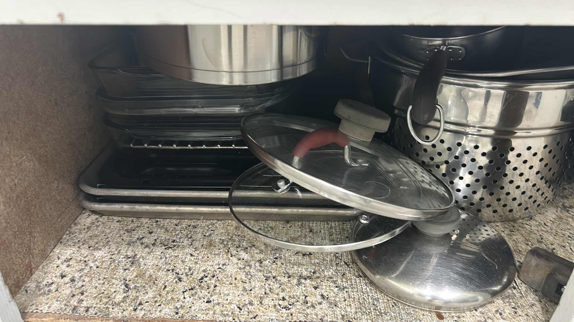 Photo 3 of CONTENTS OF CABINET POTS PANS