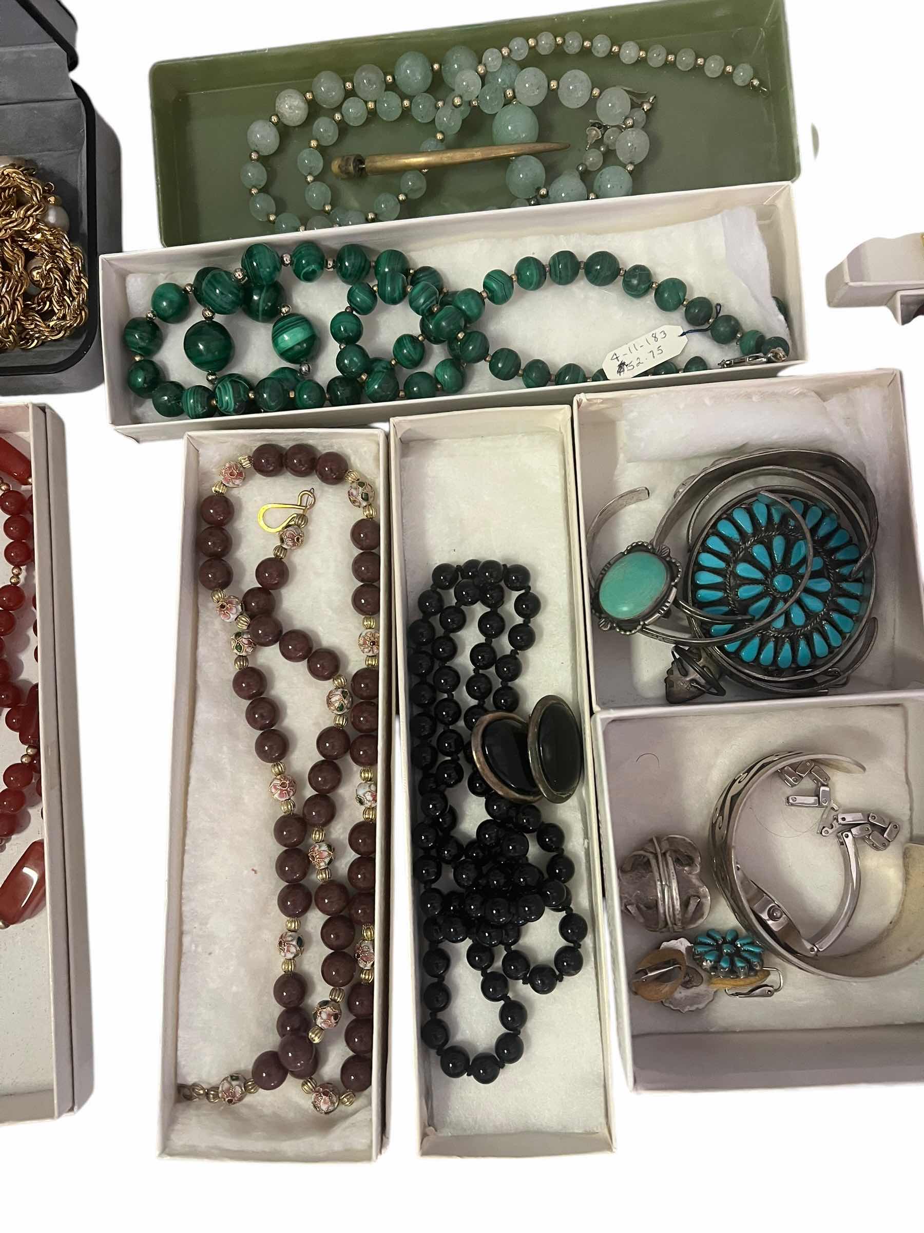 Photo 1 of CONTENTS OF BOX- VARIOUS FASHION JEWELRY. NECKLACES, BRACELETS, RINGS.