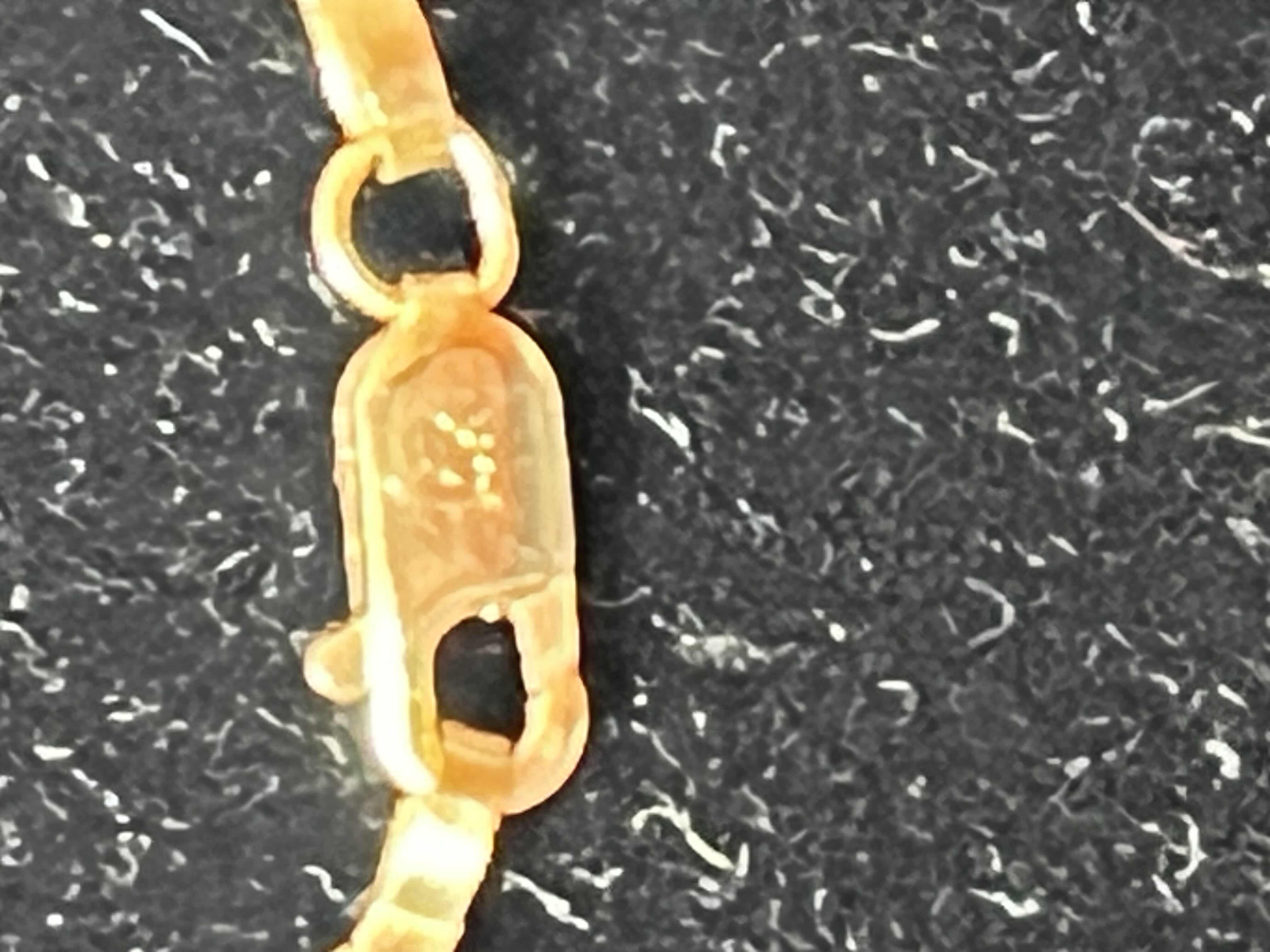 Photo 1 of 14K SMALL GOLD FLOWER NECKLACE. BOLO TIE STYLE.