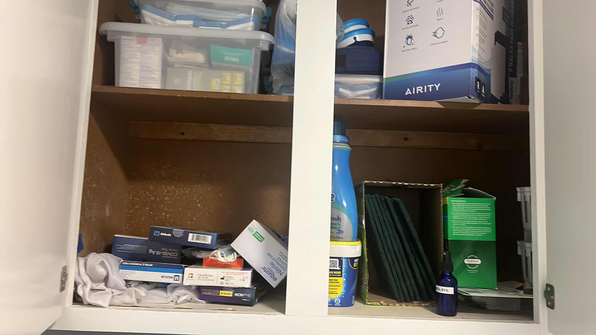 Photo 1 of CONTENTS OF LAUNDRY ROOM CABINET.