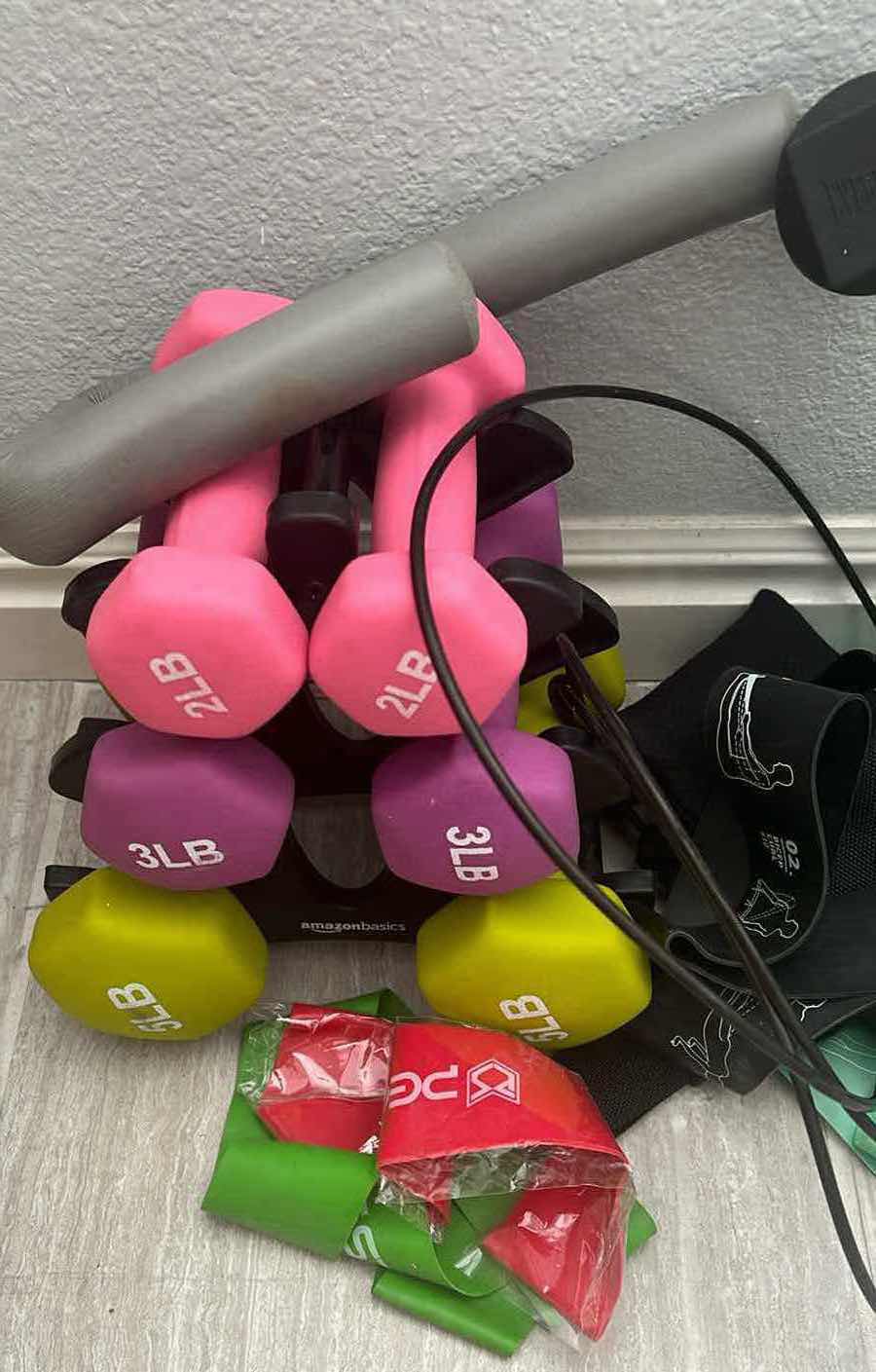 Photo 1 of EXERCISE EQUIPTMENT-COLORFUL SET OF DUMBELLS-RESISTANCE BANDS ETC…THIGH PRESS.