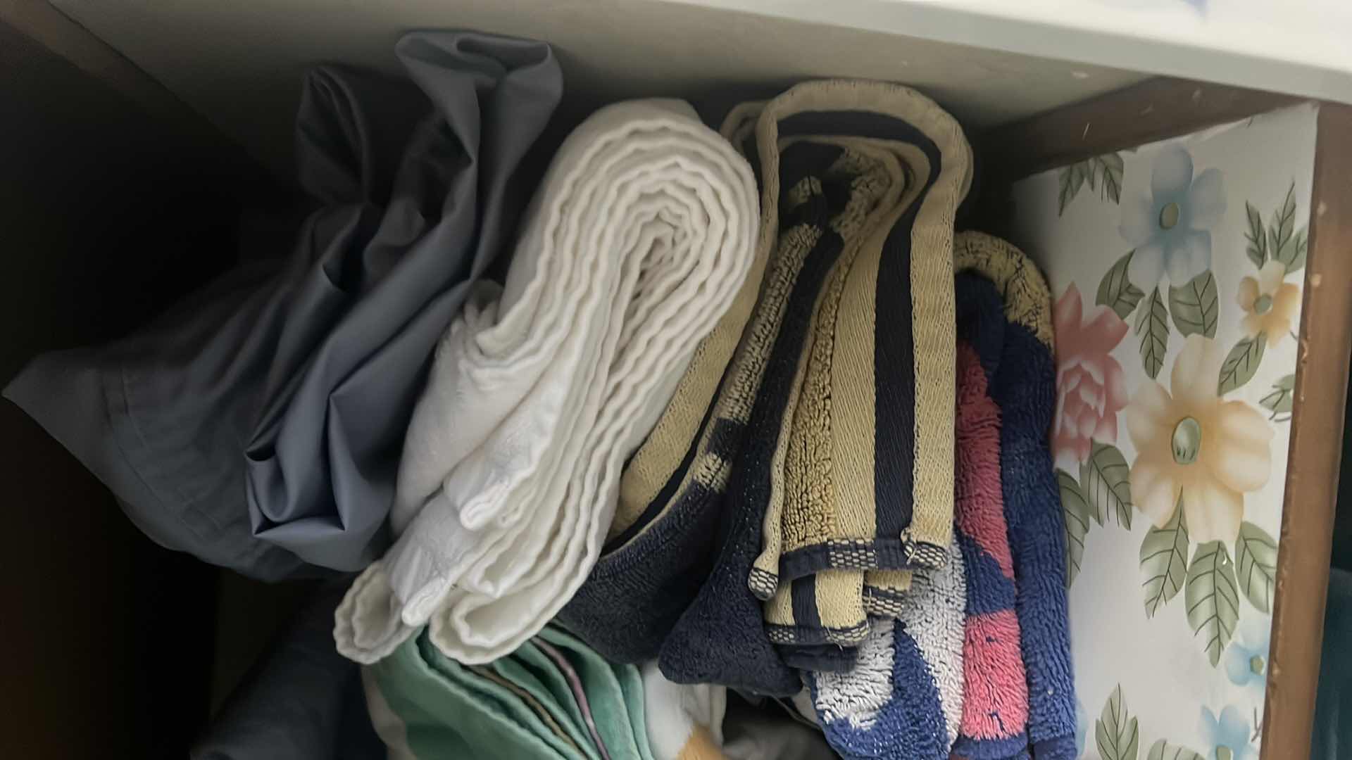 Photo 1 of CONTENTS OF LINEN CABINET. TOWELS AND BLANKETS.