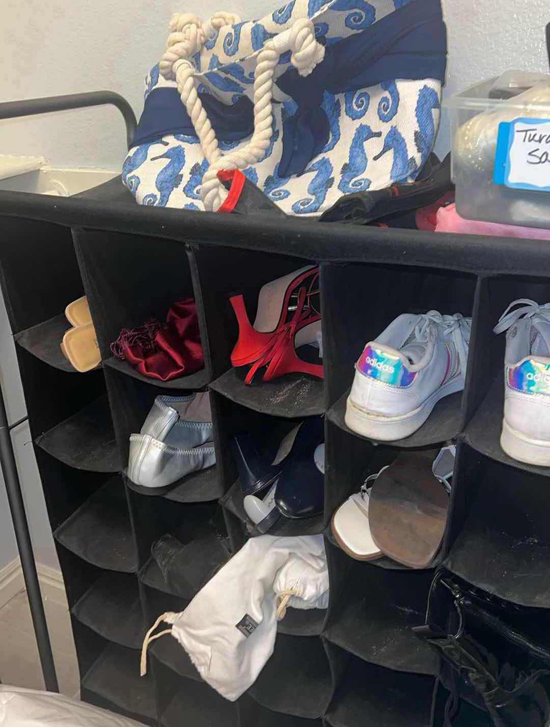 Photo 1 of BLACK CANVAS SHOE RACK-INCLUDES VARIOUS WOMENS SHOES, 7.5-8.5 SIZES