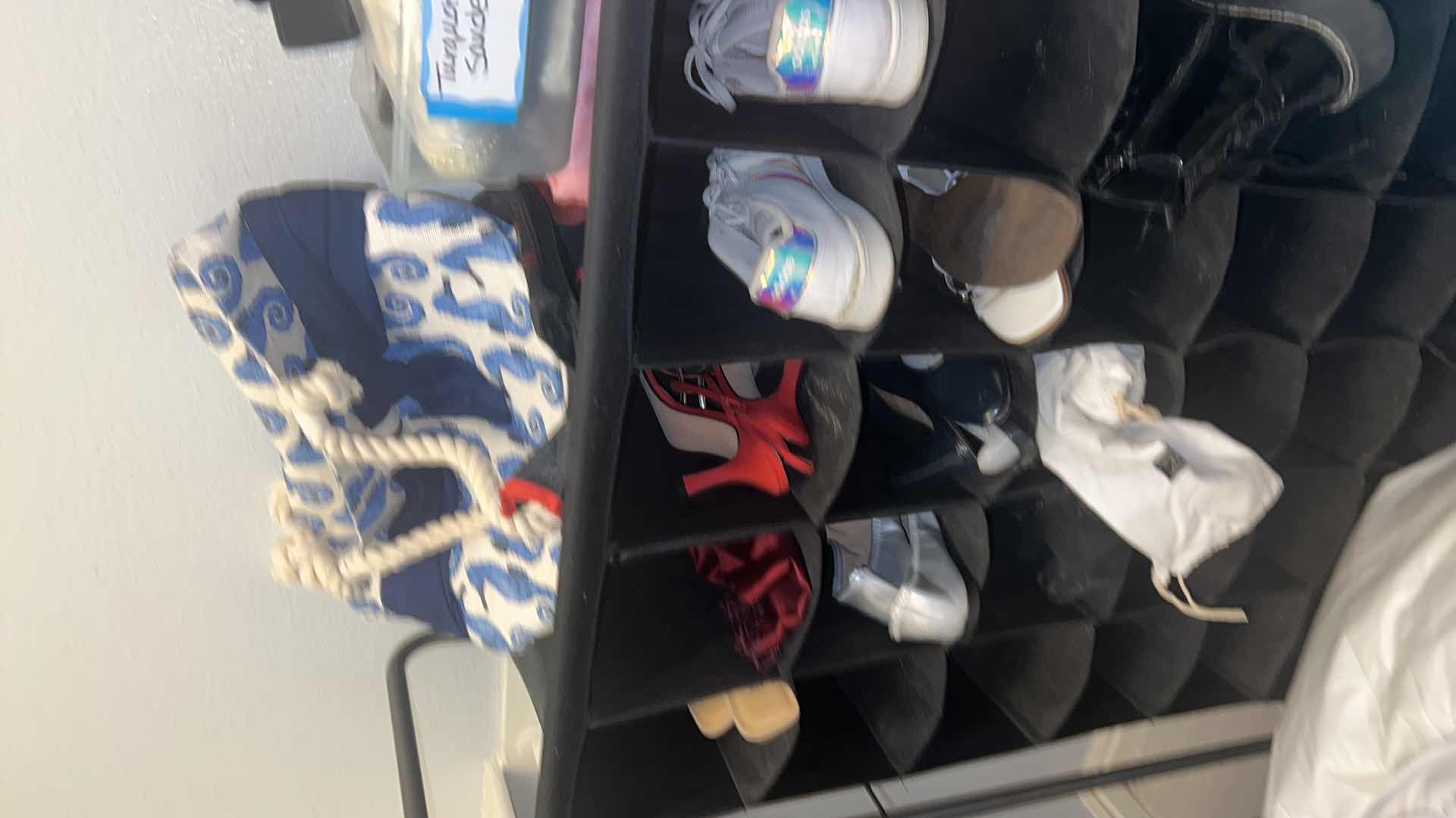 Photo 1 of BLACK CANVAS SHOE RACK-INCLUDES VARIOUS WOMENS SHOES, 7.5-8.5 SIZES