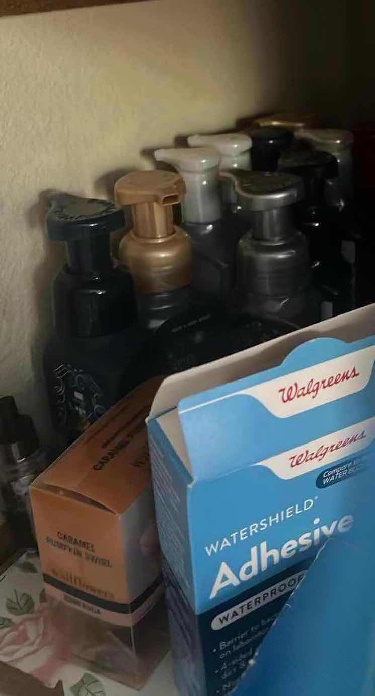 Photo 1 of CONTENTS OF CABINET-BATHROOM ITEMS