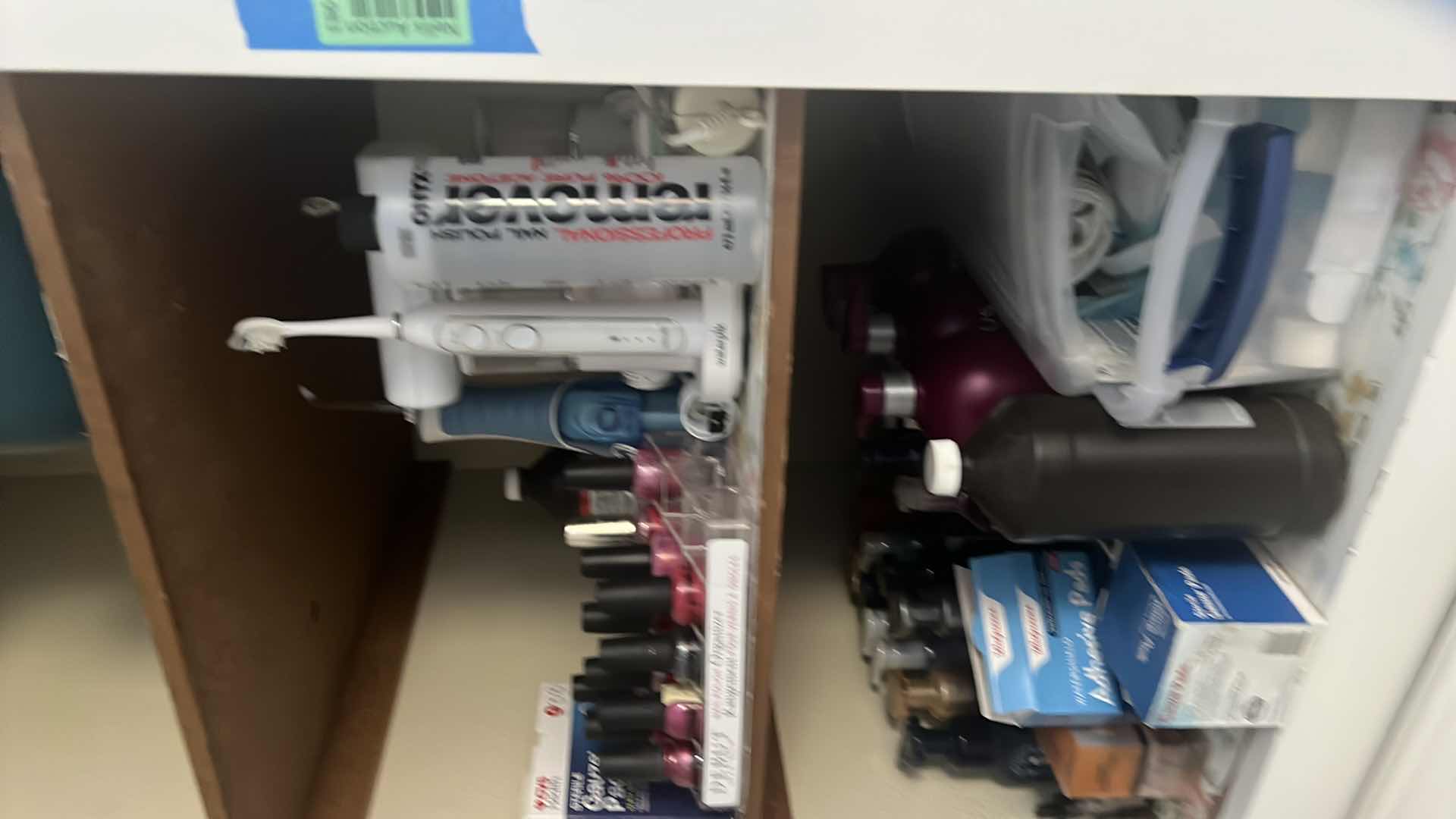 Photo 1 of CONTENTS OF CABINET-BATHROOM ITEMS