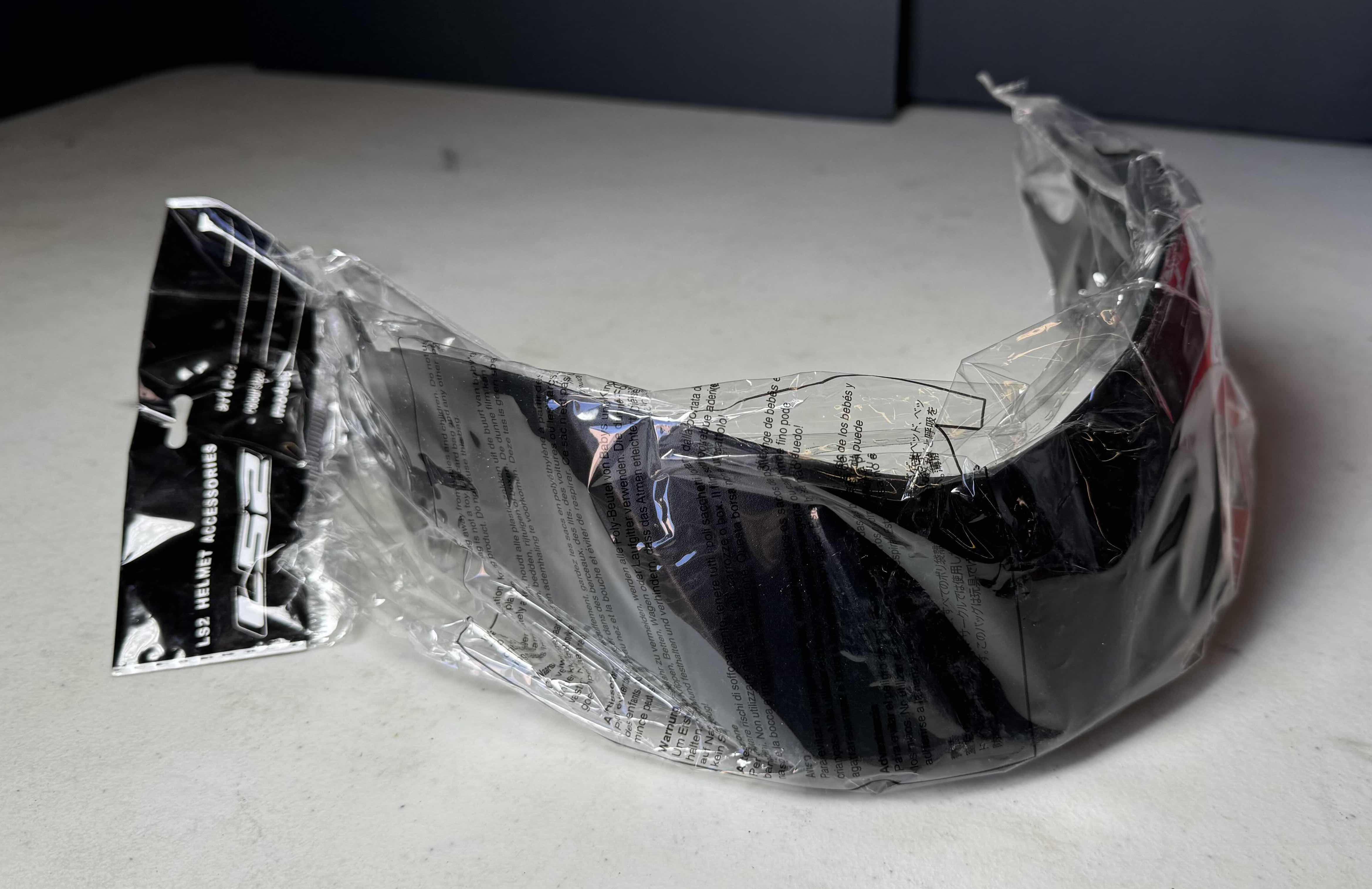 Photo 1 of LS2 VERSO MOTORCYCLE HELMET SOLID MATT TITANIUM WITH COVER SIZE SMALL
