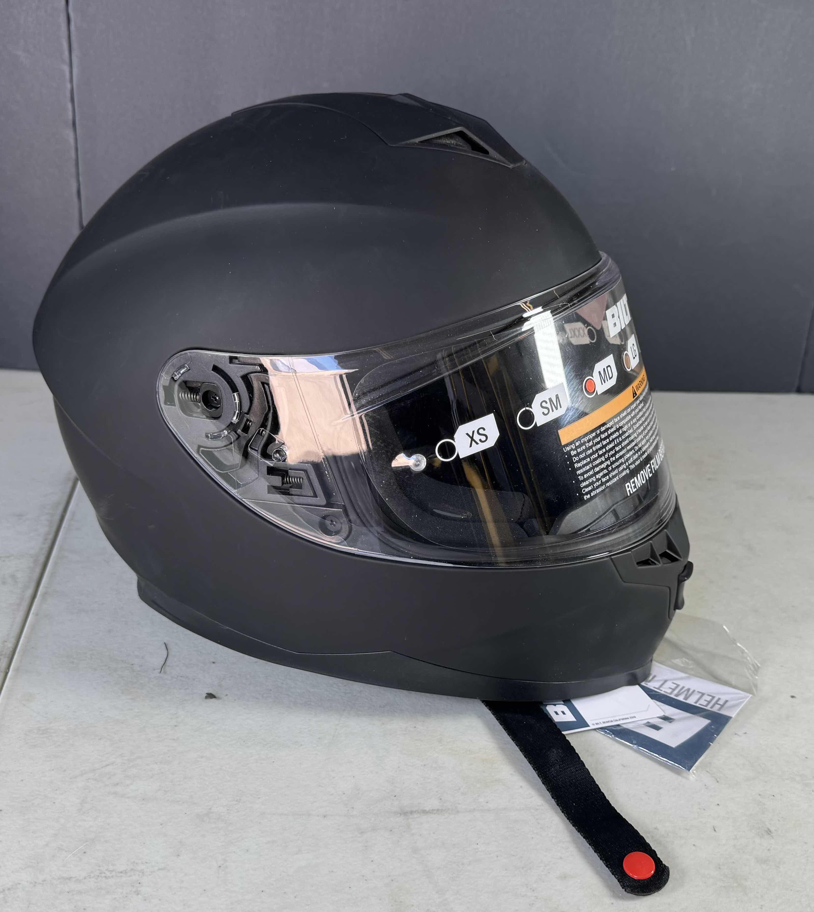 Photo 1 of BILT MATTE BLACK MOTORCYCLE HELMET WITH COVER SIZE MEDIUM
