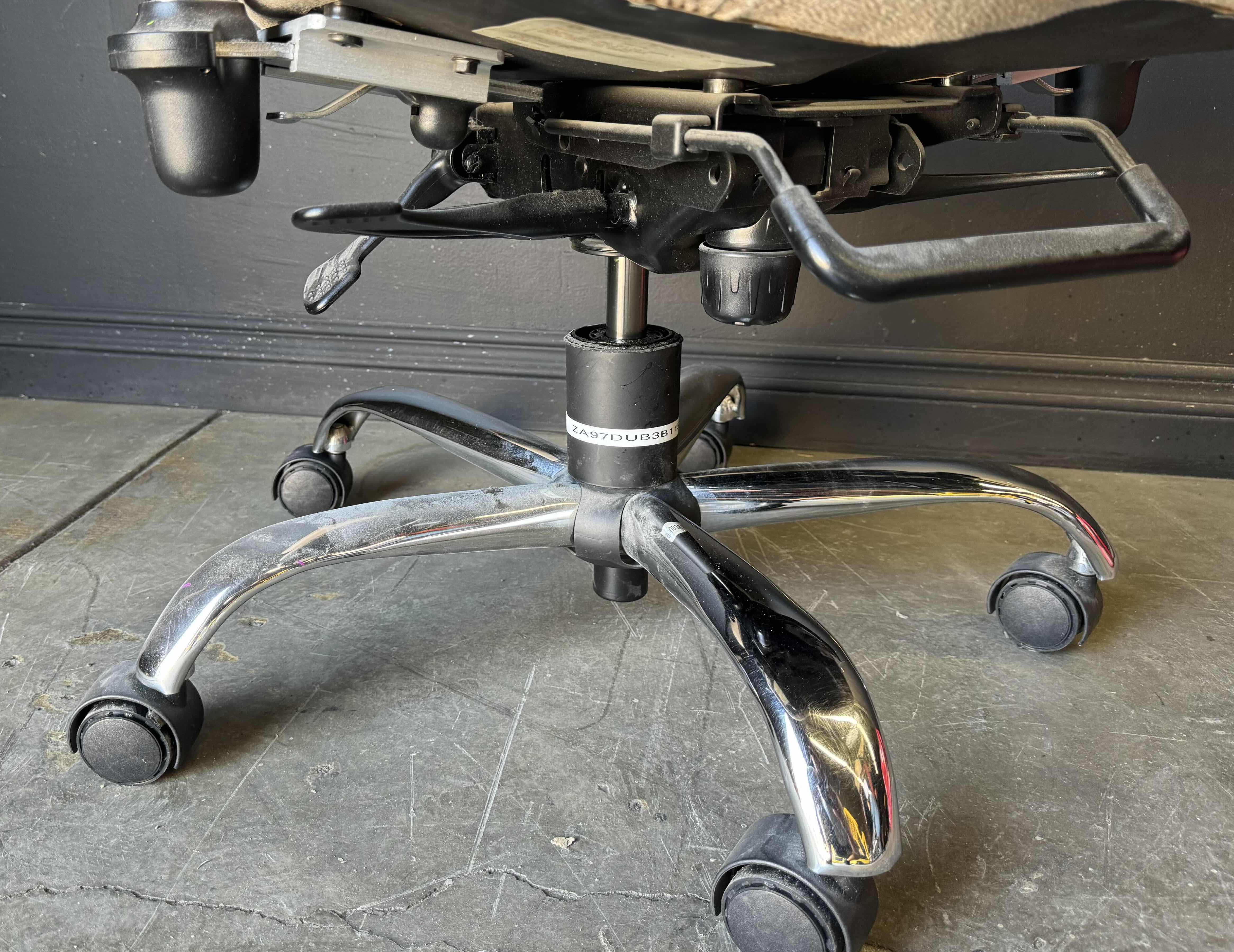 Photo 1 of TAN OFFICE CHAIR WITH HEAD REST