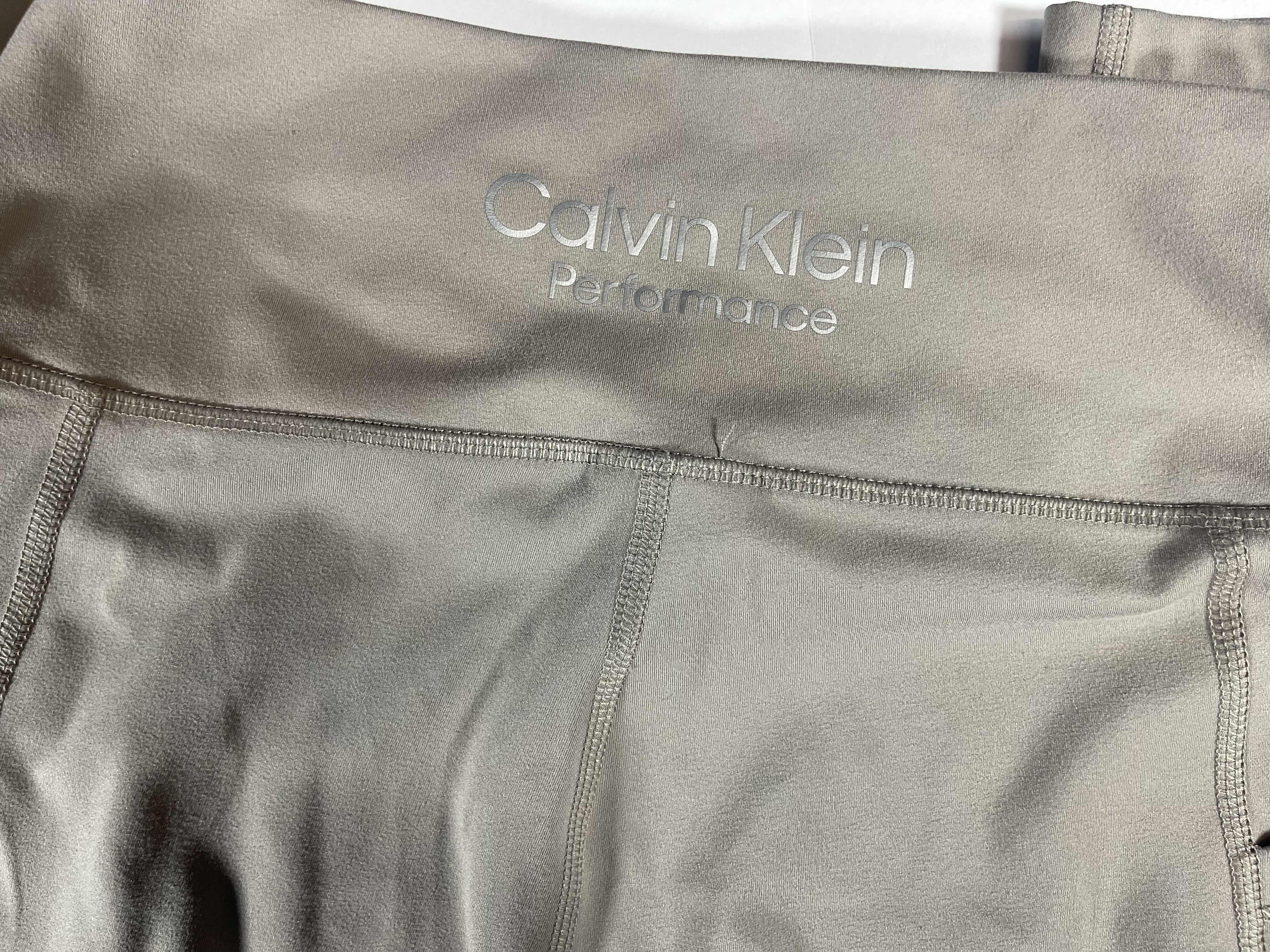 Photo 1 of WOMENS SPORTS APPAREL - CALVIN KLEIN, FABLETICS & SOMMER RAY SIZE MEDIUM