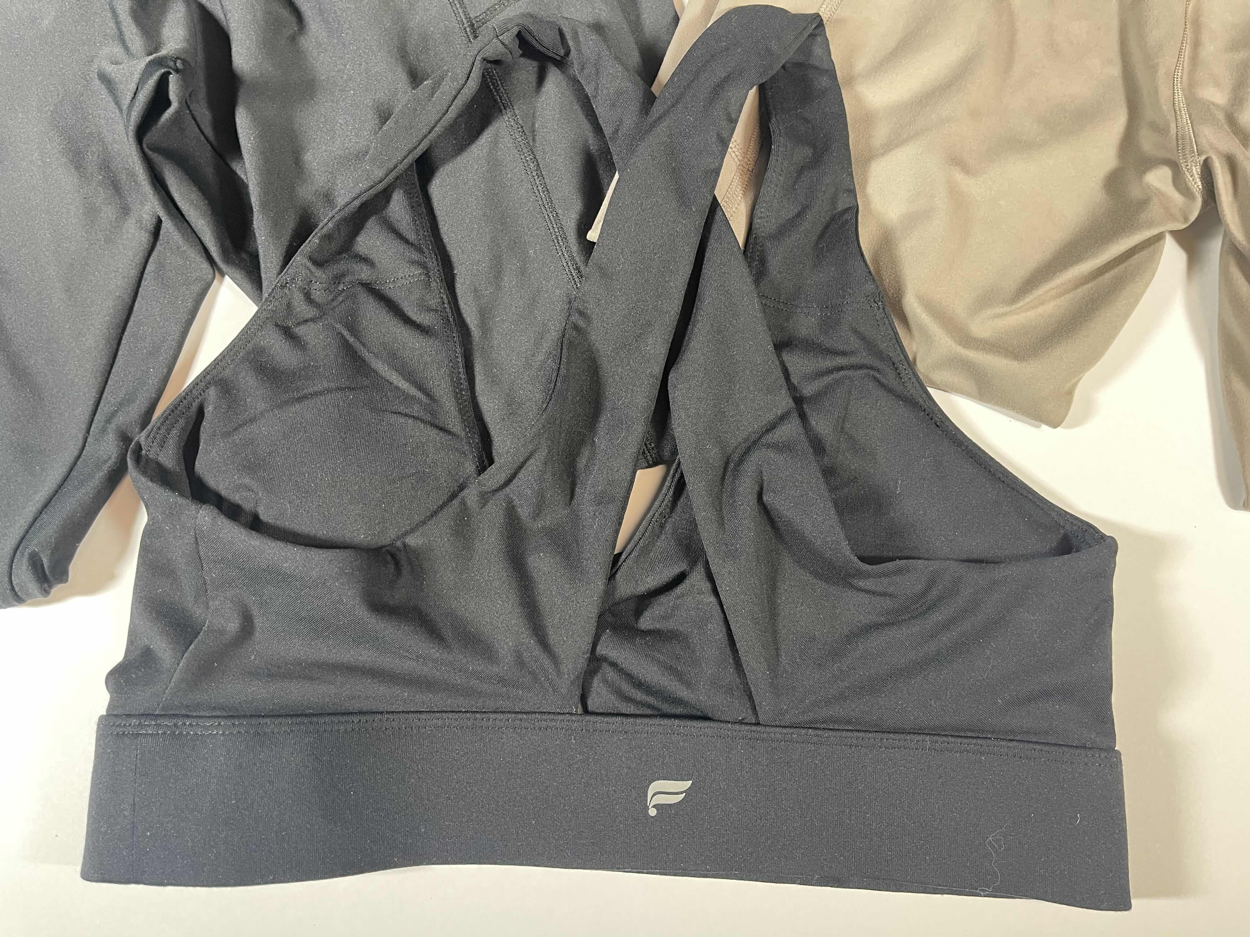 Photo 1 of WOMENS SPORTS APPAREL - CALVIN KLEIN, FABLETICS & SOMMER RAY SIZE MEDIUM