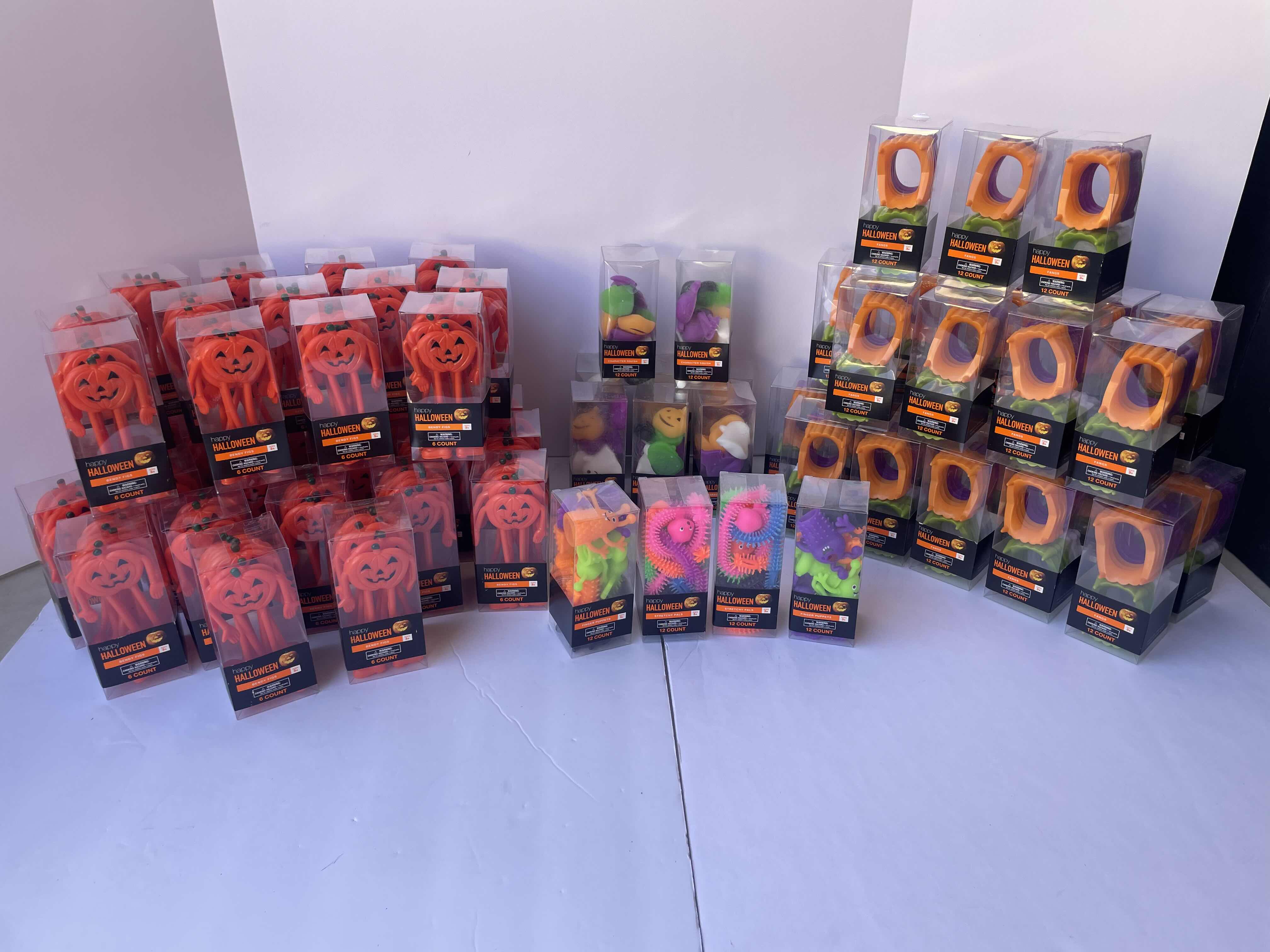 View 1 of HAPPY HALLOWEEN MINIS LARGE ASSORTMENT - PUMPKIN BENDY FIGS (36), TOY FANGS (23), CHARACTER SQUISH TOY (8), STRETCHY PALS TOY (2) & FINGER PUPPETS (2) - TOTAL 71 BOXES