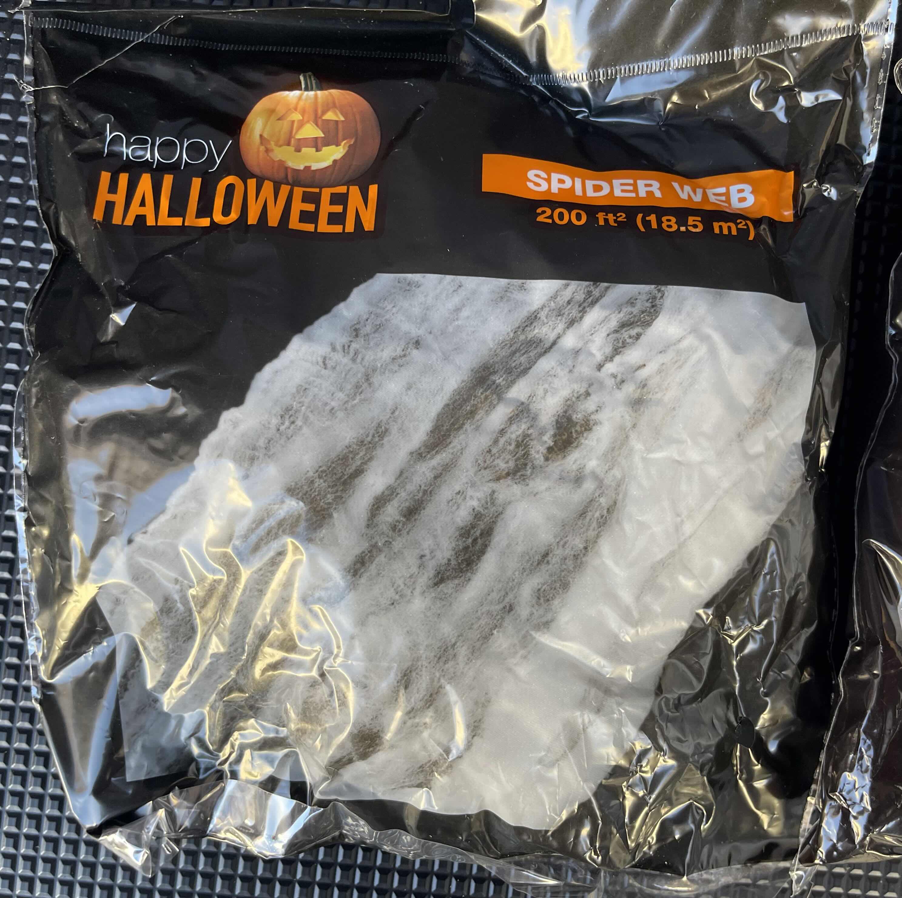 Photo 1 of BOX OF HAPPY HALLOWEEN SPIDER WEBS - SPIDER WEB BAGS (34), SPIDER WEB YIKES IN THE YARD (9) & GAUZE SPIDER WEB BAGS (3)