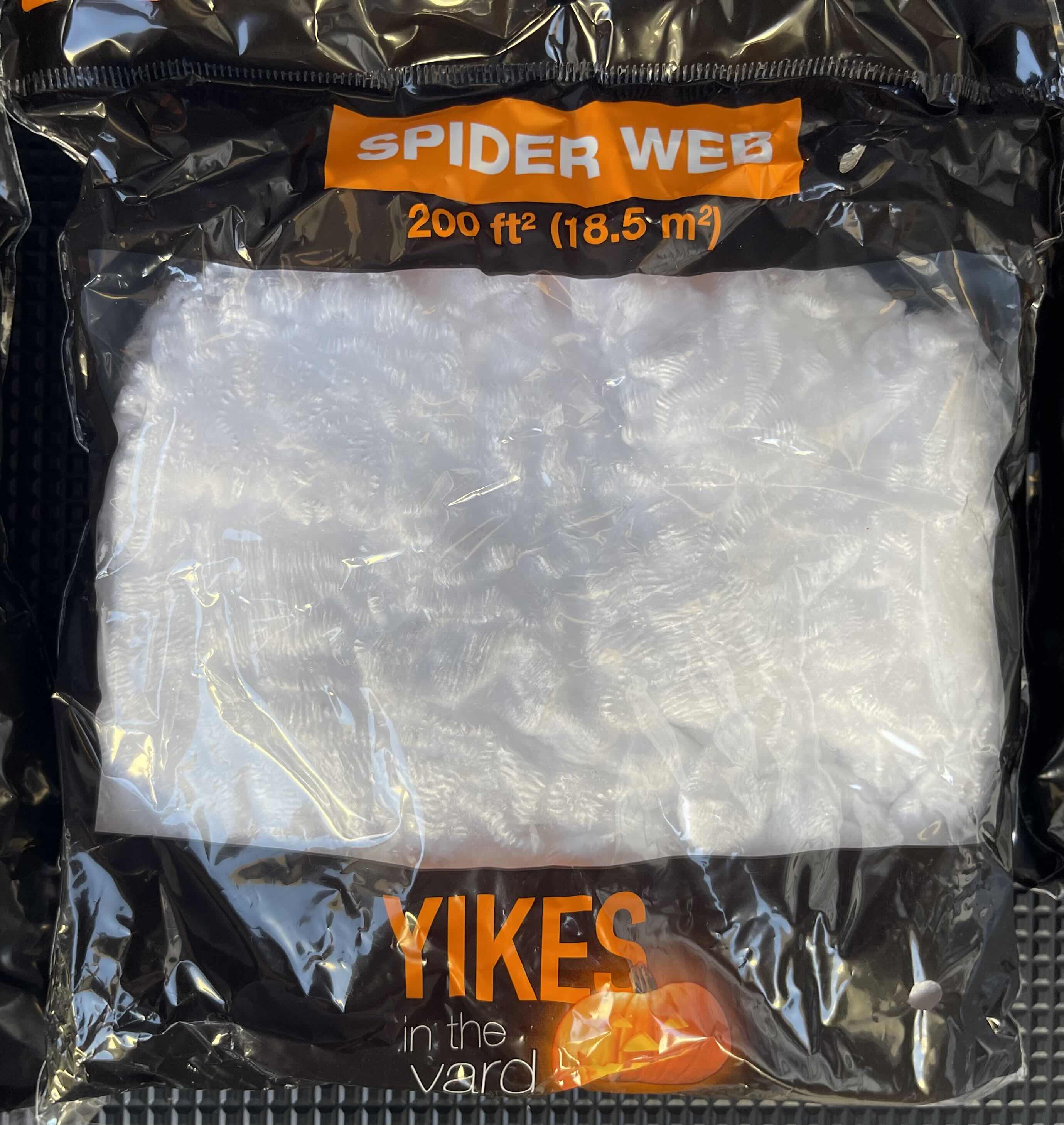 Photo 1 of BOX OF HAPPY HALLOWEEN SPIDER WEBS - SPIDER WEB BAGS (23), SPIDER WEB YIKES IN THE YARD (10) & GAUZE SPIDER WEB BAGS (2)