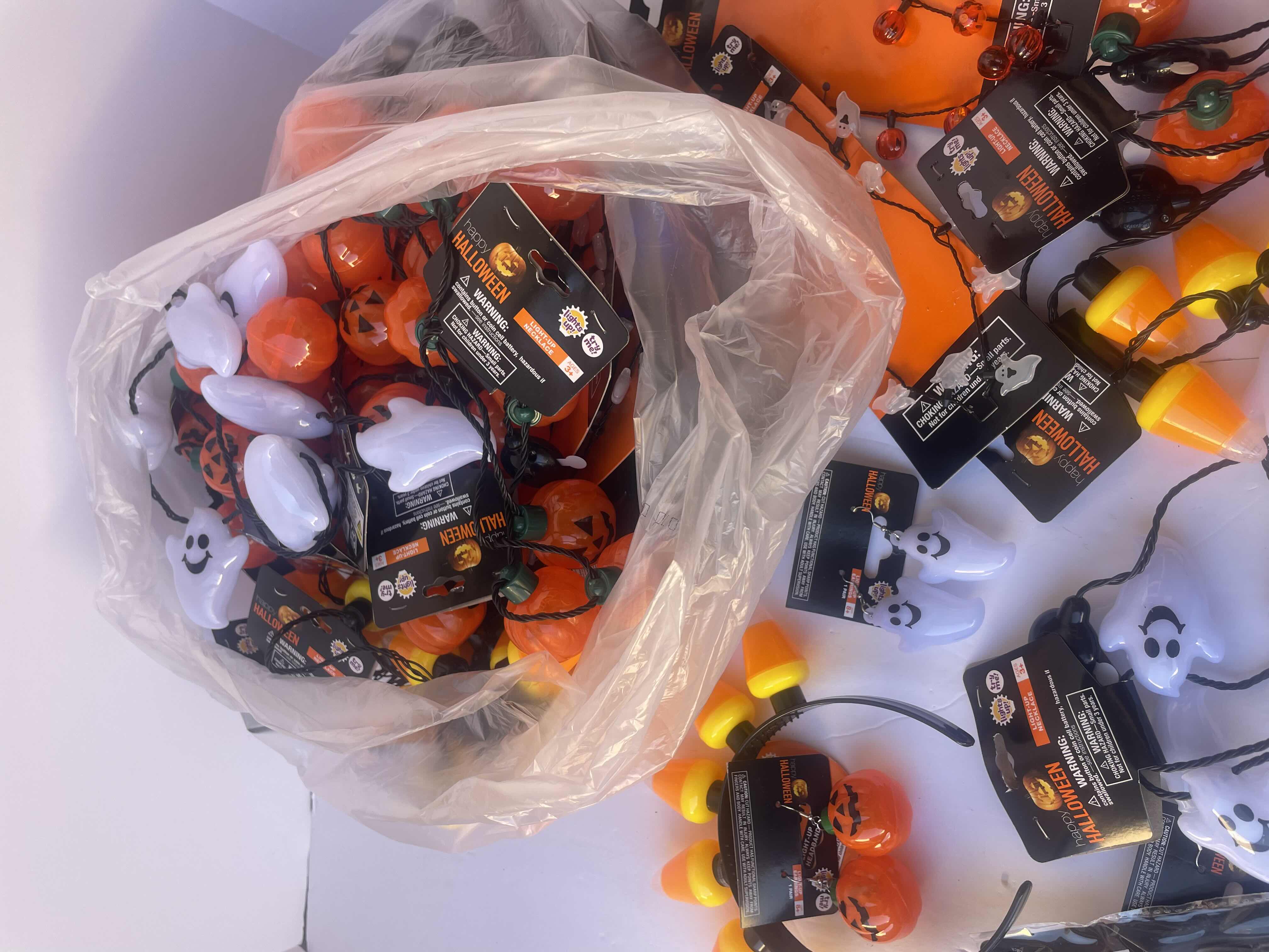 Photo 1 of NEW HAPPY HALLOWEEN LIGHT-UP NECKLACES, HEAD BANDS, BRACELETS AND OTHER FUN HALLOWEEN WEAR (30 PIECES)
