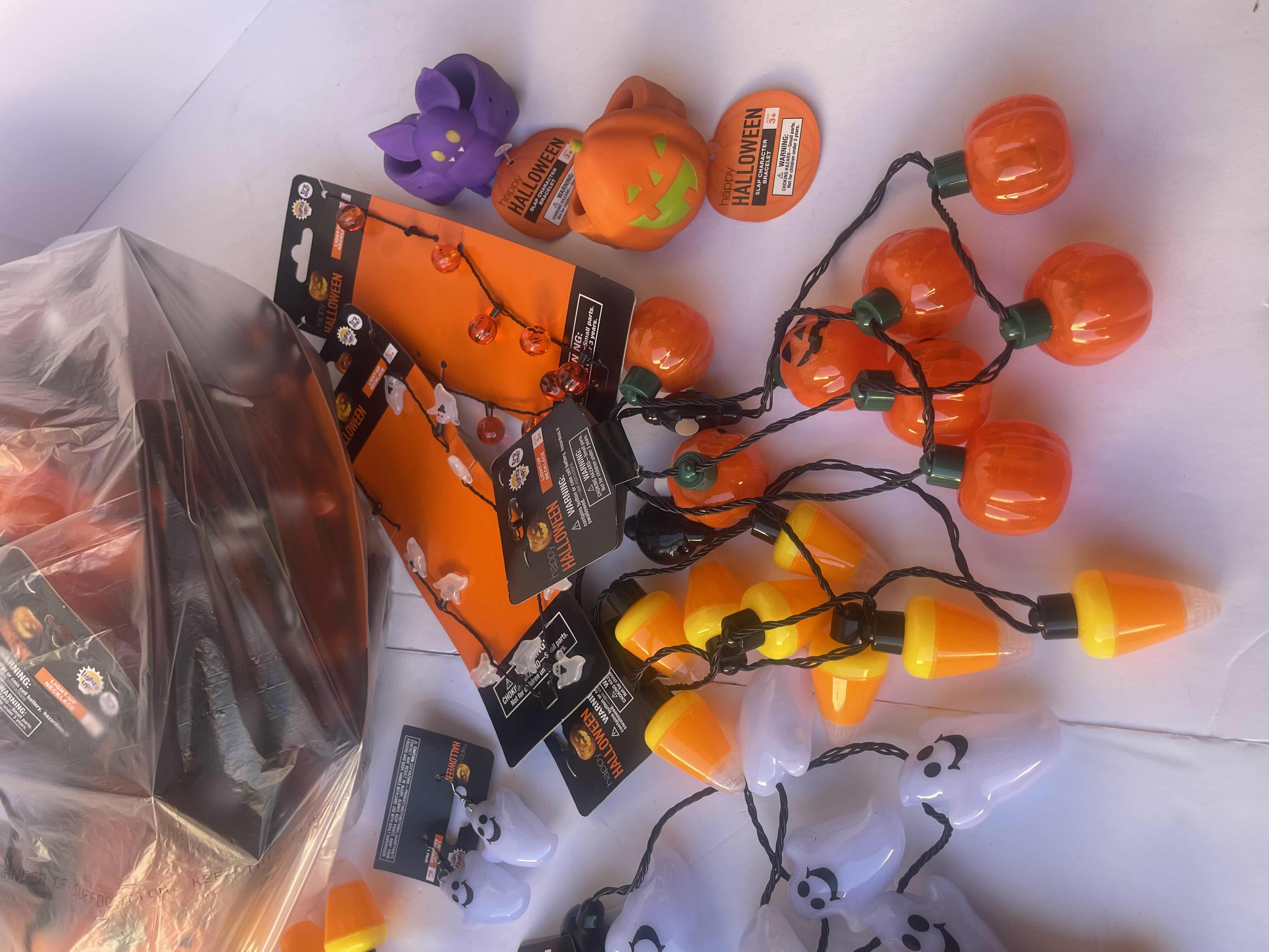 Photo 1 of NEW HAPPY HALLOWEEN LIGHT-UP NECKLACES, HEAD BANDS, BRACELETS AND OTHER FUN HALLOWEEN WEAR (30 PIECES)
