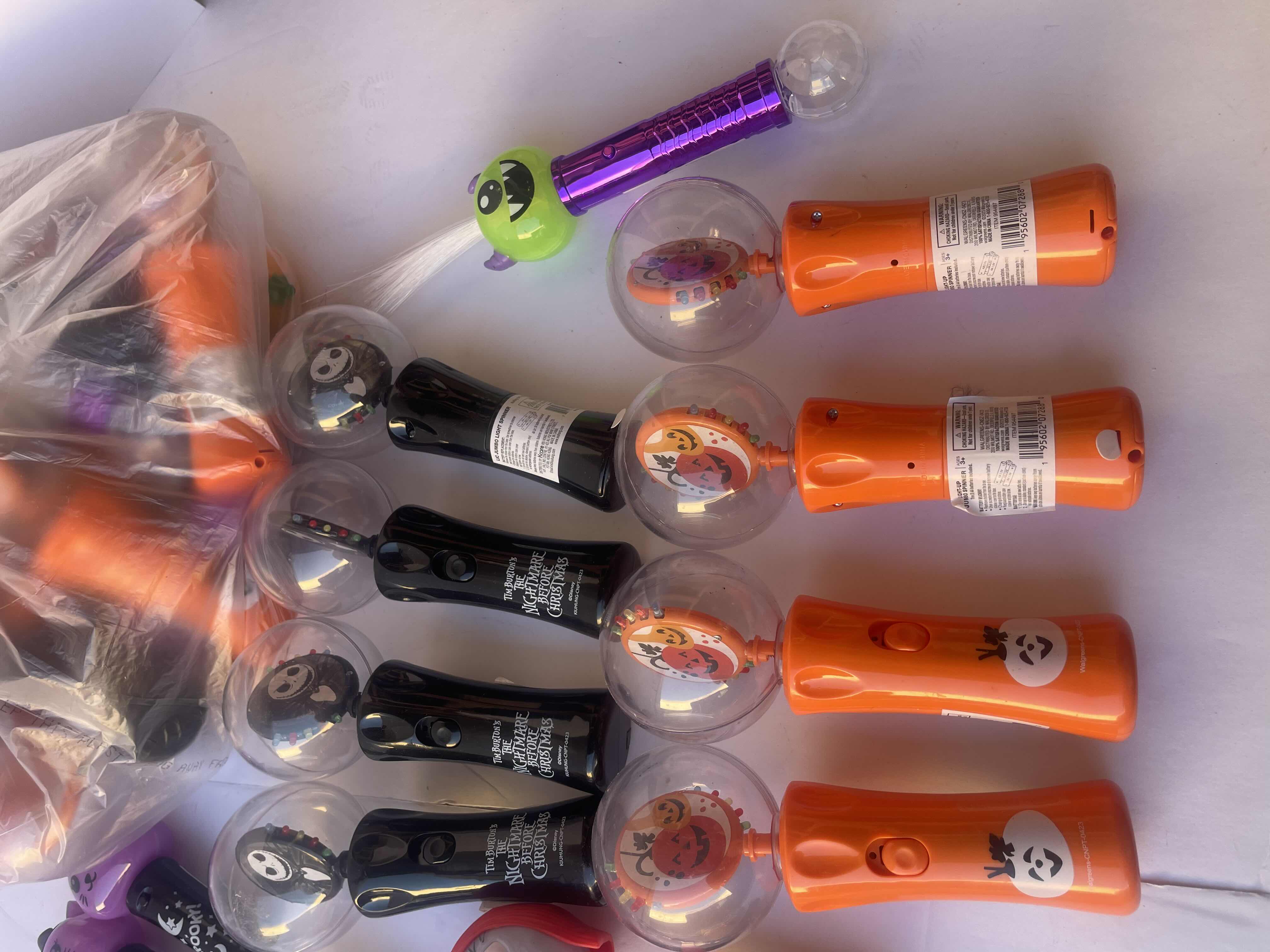 Photo 1 of NIGHTMARE BEFORE CHRISTMAS SALLY & JACK LIGHT UP SPINNERS AND OTHER ASSORTED HALLOWEEN LIGHT-UP WANDS (28 PIECES) 