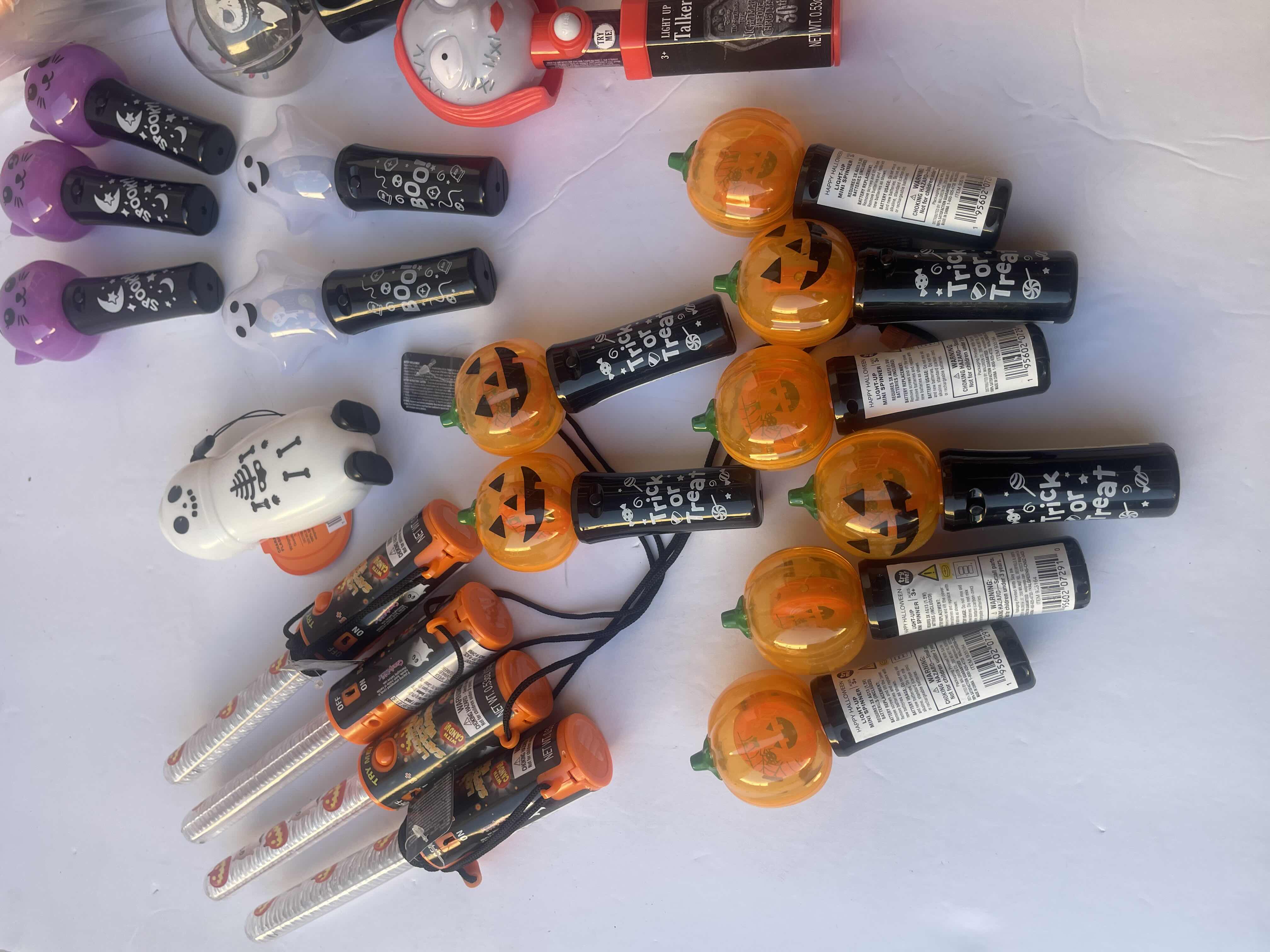 Photo 1 of NIGHTMARE BEFORE CHRISTMAS SALLY & JACK LIGHT UP SPINNERS AND OTHER ASSORTED HALLOWEEN LIGHT-UP WANDS (28 PIECES) 