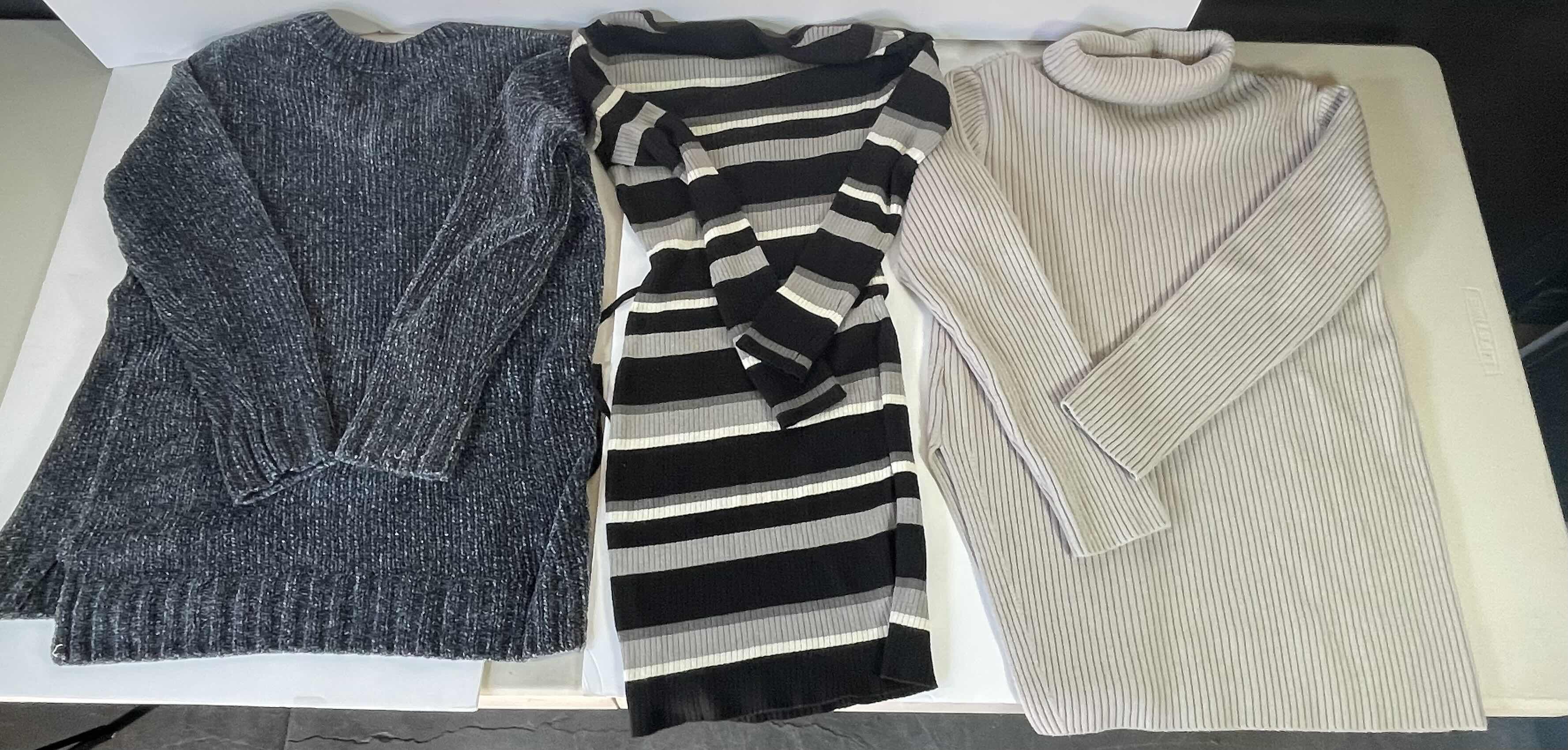 Photo 1 of WOMENS LONG SLEEVE SWEATERS (3) SIZE MEDIUM