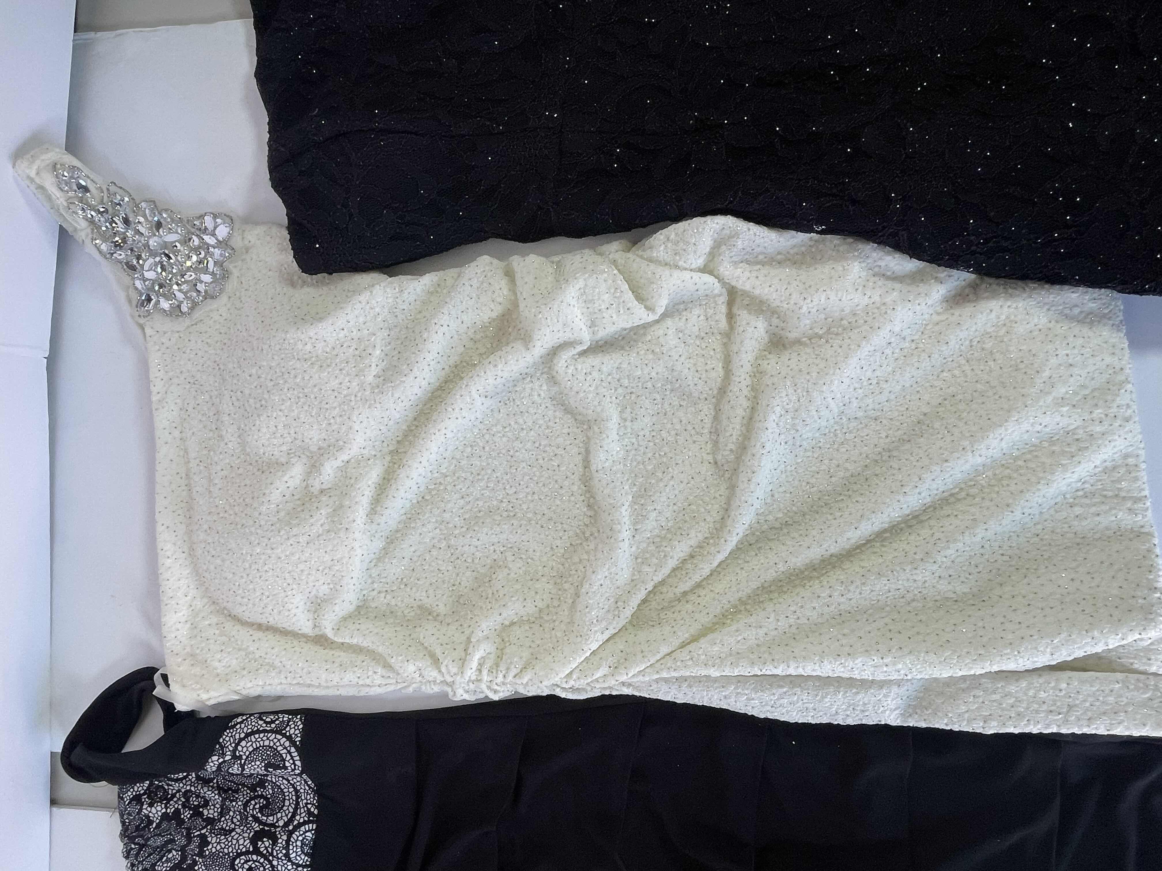 Photo 1 of WOMENS SHORT DRESSES (4) SIZE SMALL