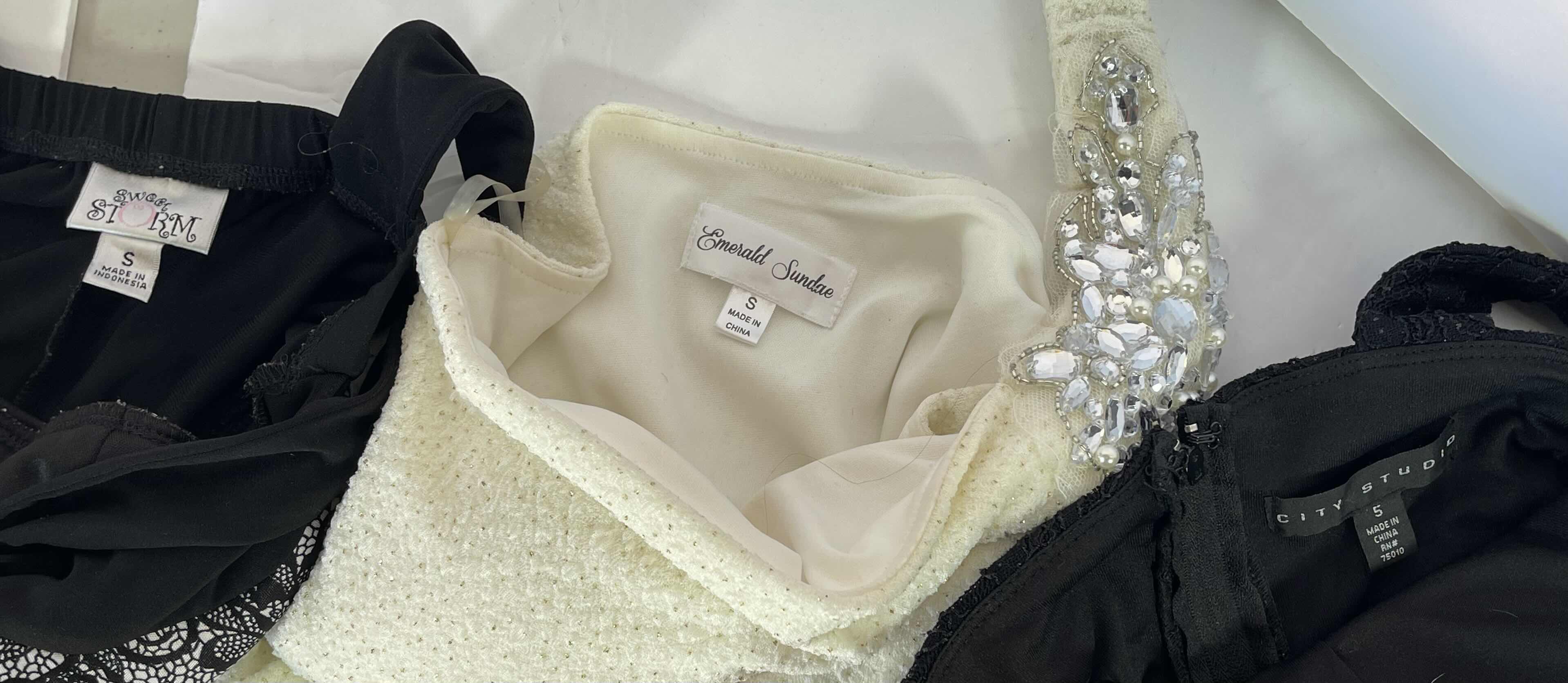 Photo 1 of WOMENS SHORT DRESSES (4) SIZE SMALL