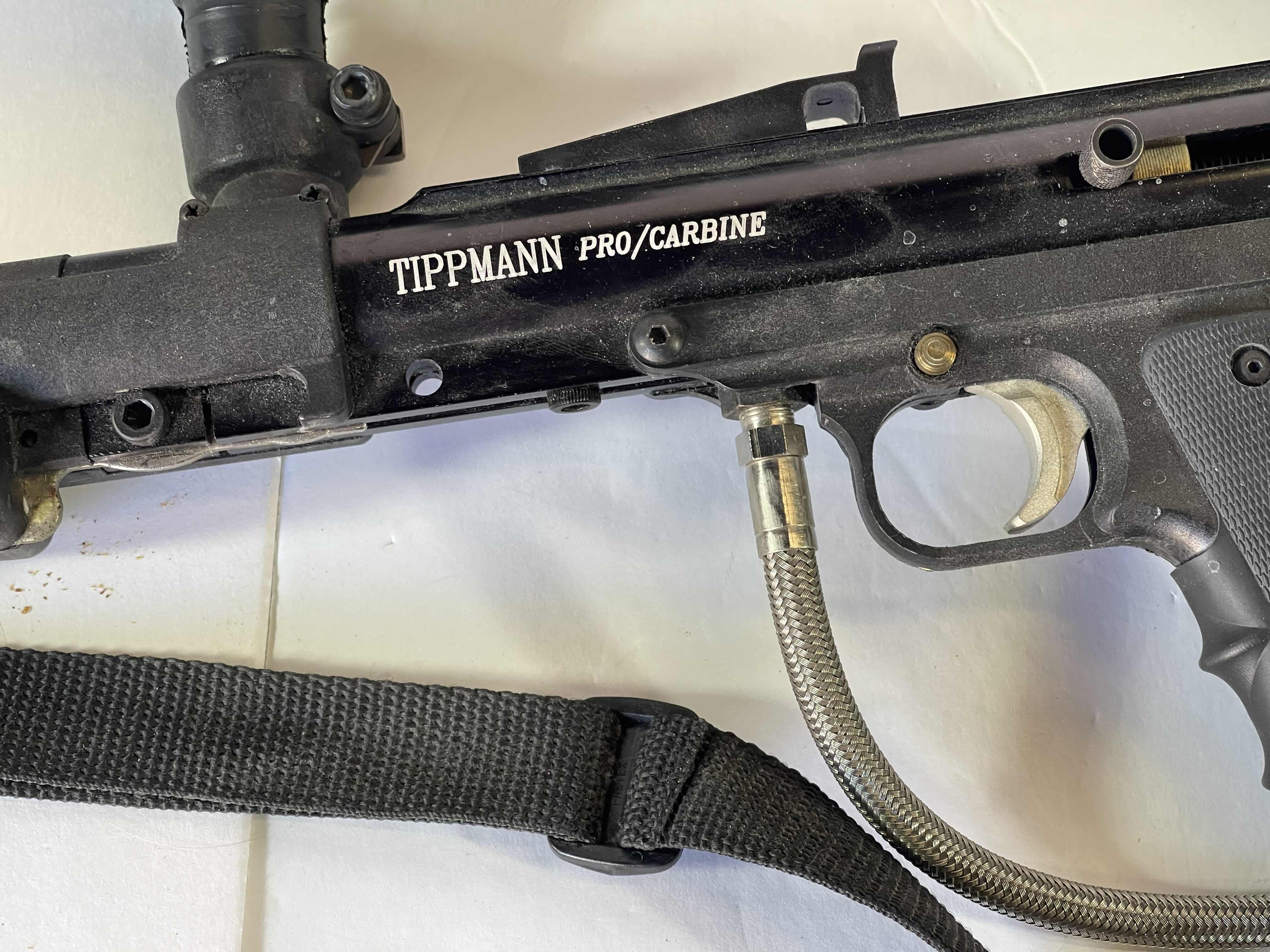 Photo 1 of TIPPMANN PRO/CARBINE AIR PAINT BALL GUN WITH ACCESSORIES AND 250 PAINTBALLS