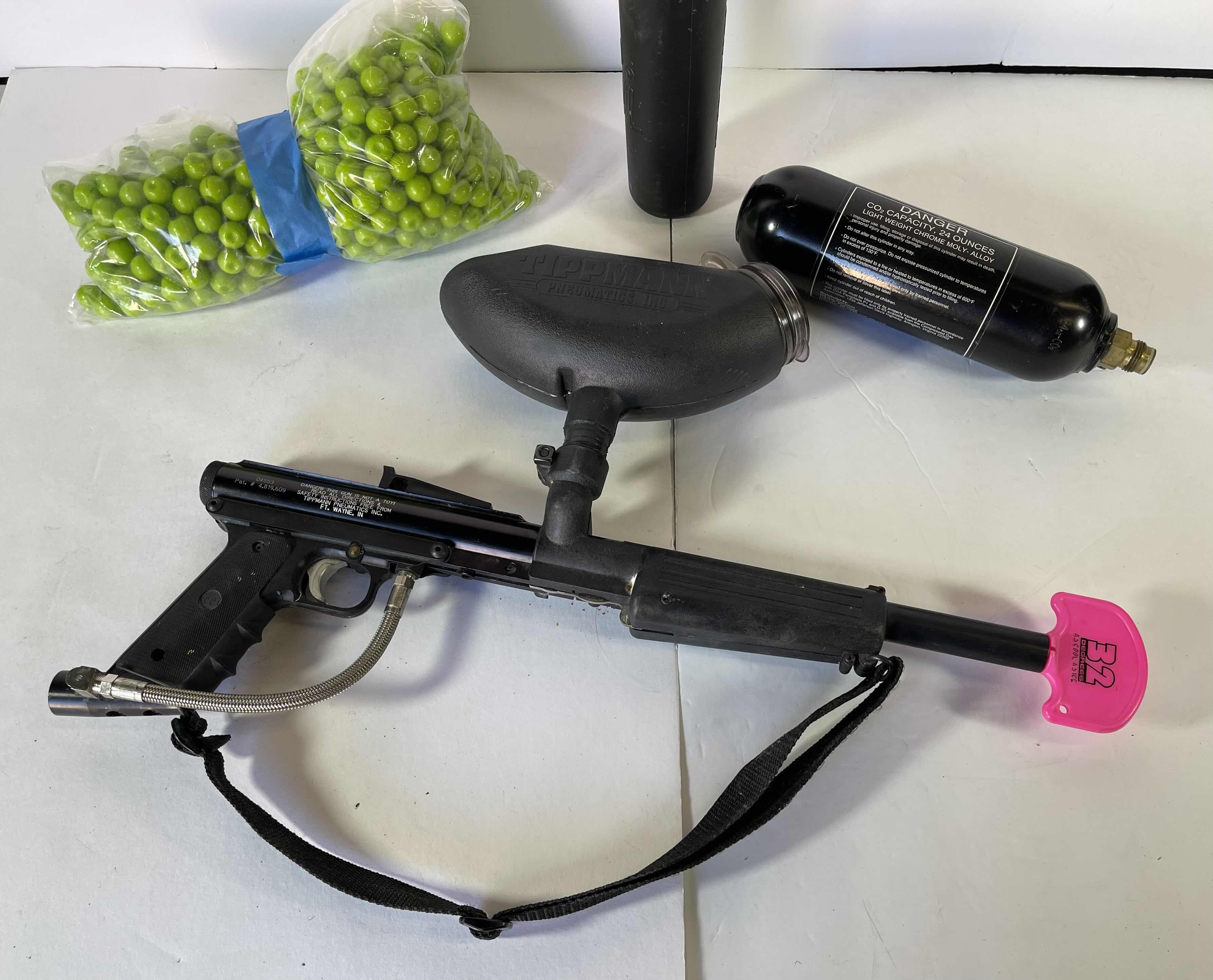 Photo 1 of TIPPMANN PRO/CARBINE AIR PAINT BALL GUN WITH ACCESSORIES AND 250 PAINTBALLS