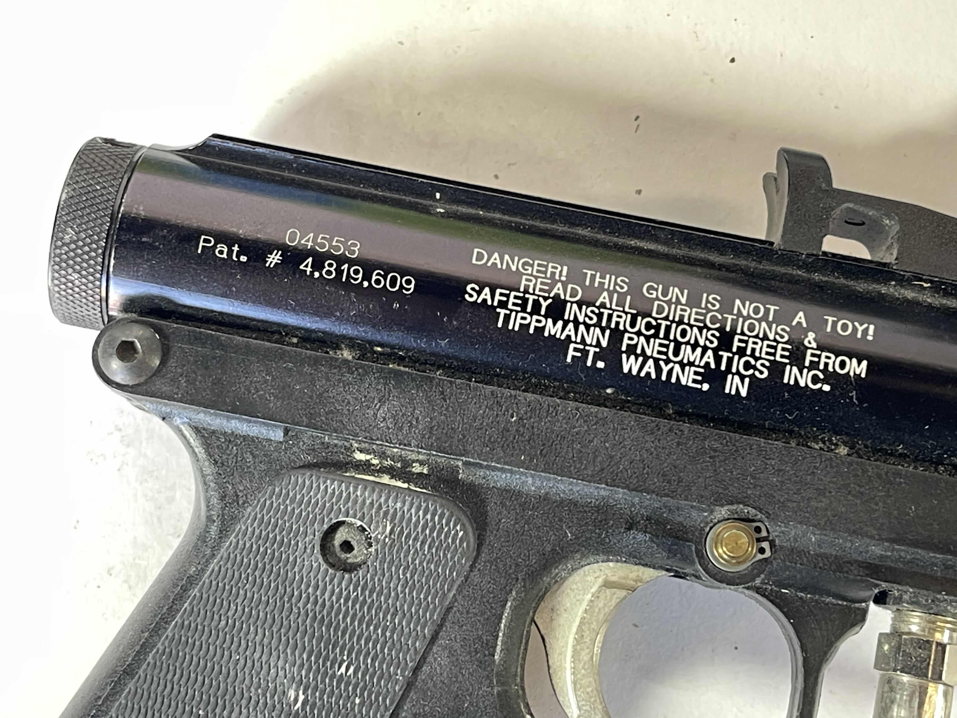 Photo 1 of TIPPMANN PRO/CARBINE AIR PAINT BALL GUN WITH ACCESSORIES AND 250 PAINTBALLS