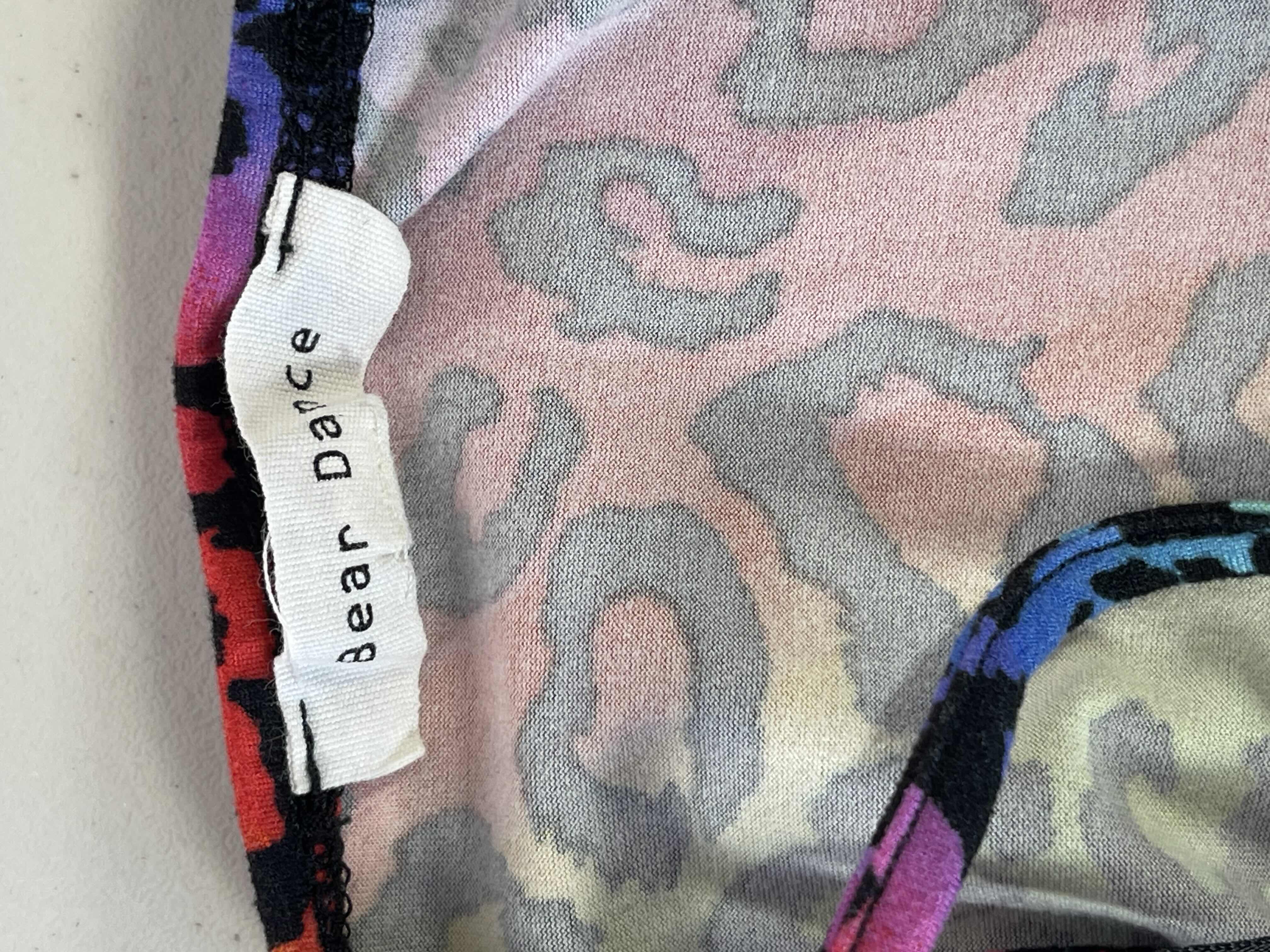 Photo 1 of WOMENS ASSORTED TOPS AND DRESSES