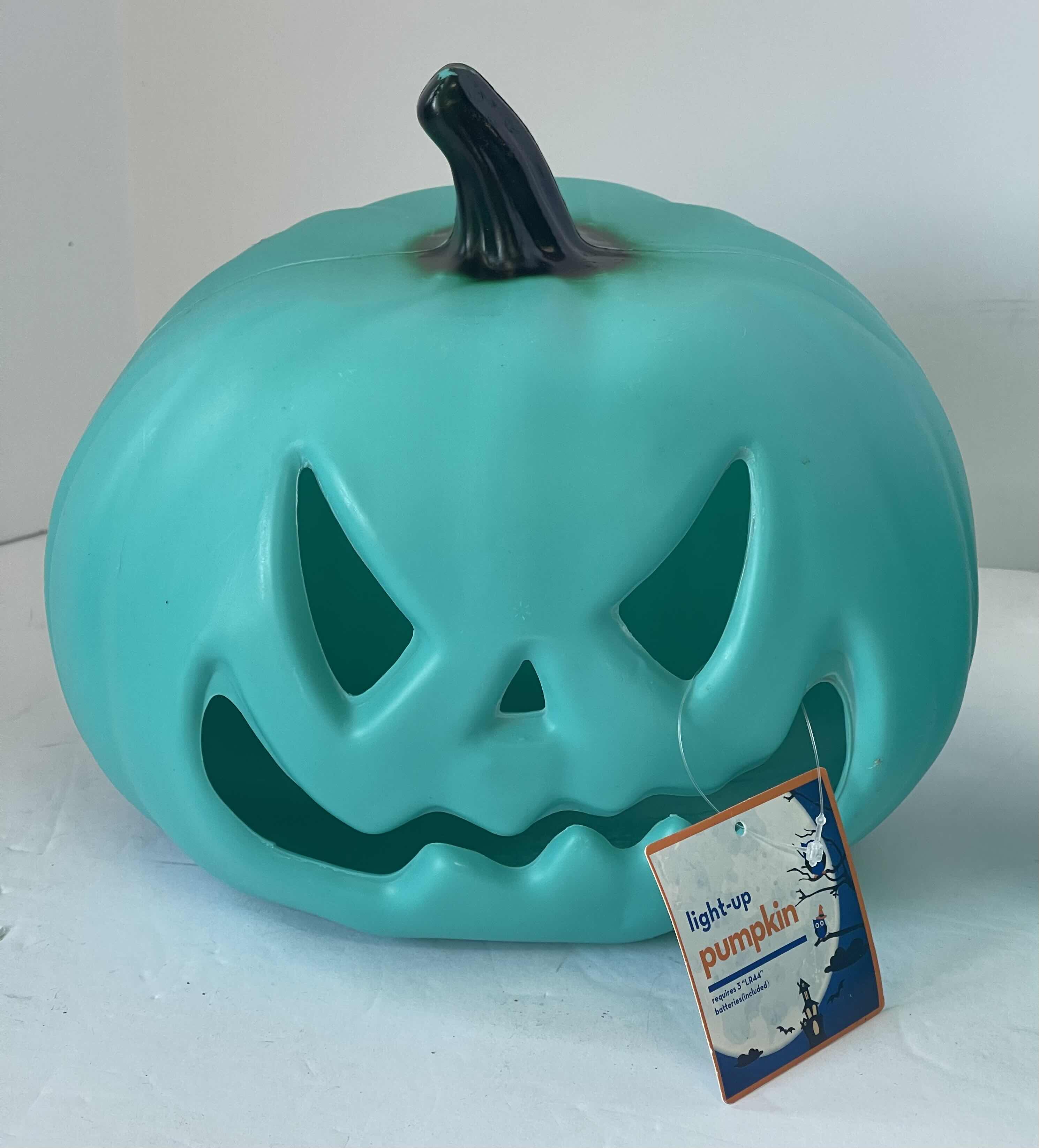 Photo 1 of GREEN PLASTIC LED LIGHT UP PUMPKINS (2) H7.5” NEW